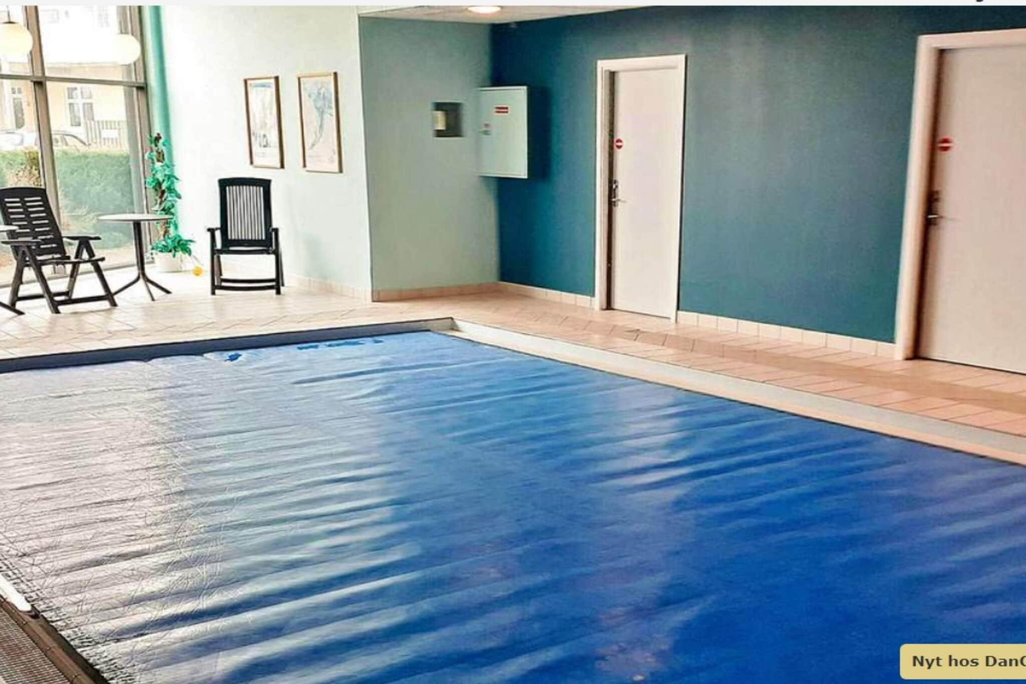 Kitchen(cooker(electric), coffee machine, dishwasher, fridge(+ freezer)), Living/bed room(TV(german television channels, danish TV channels (DR1 and TV2)), DVD player, stereo unit), bedroom(double bed), bedroom(double bed), bathroom(washbasin, shower, toilet), heating(electric), garden furniture, swimming pool(indoor), play equipment