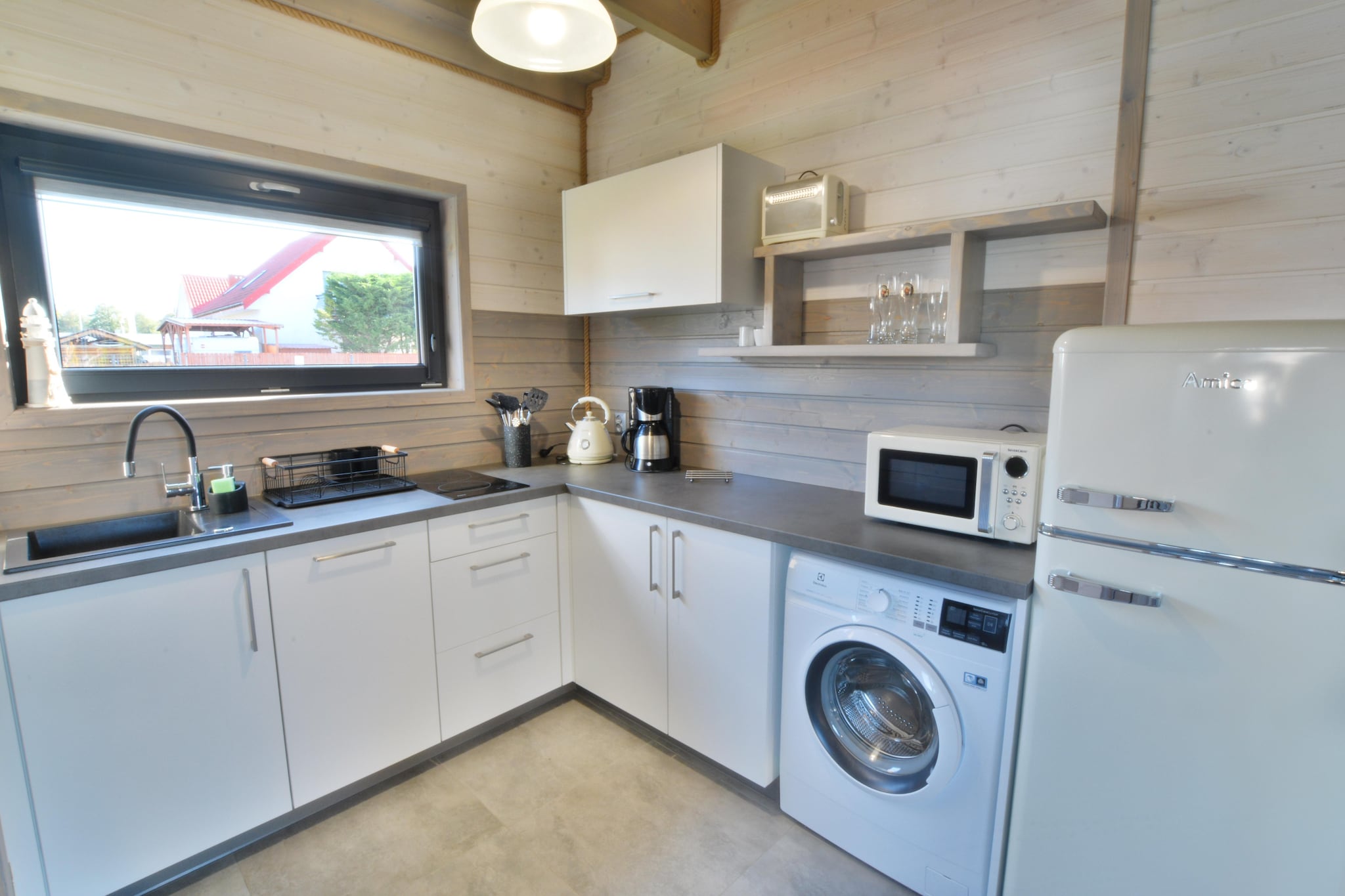 Holiday home with terrace, sauna