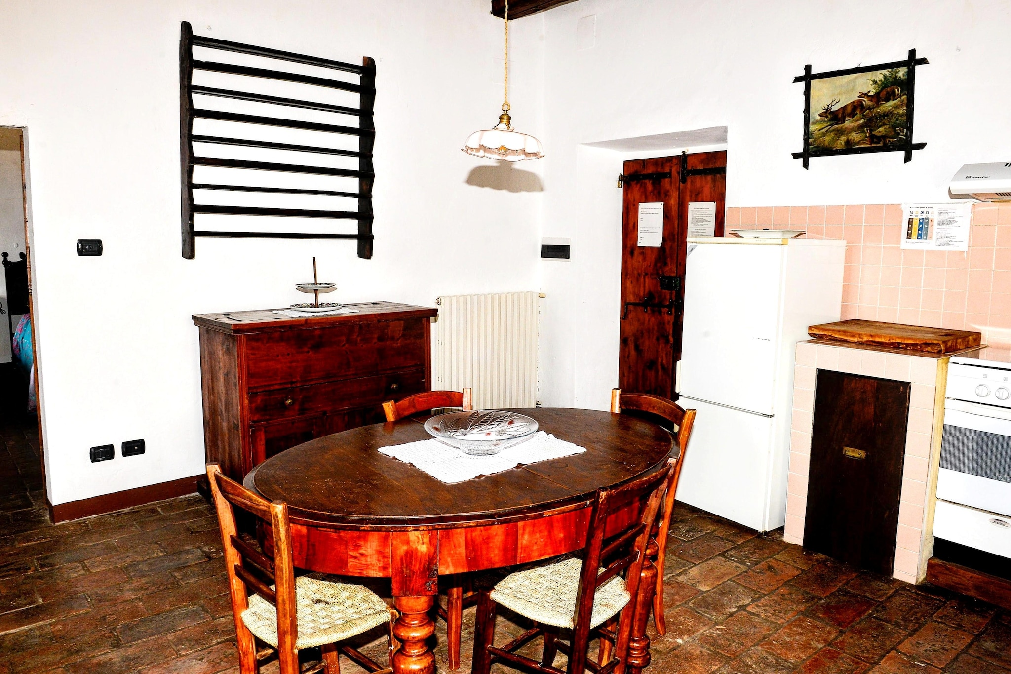 On the 1st floor: (Living room(dining table, fireplace), open kitchen(hob, coffee machine, oven, dishwasher, fridge), bedroom(single bed, single folding bed, double bed), bathroom(shower, toilet, washing machine))\n\ngarden, garden furniture, BBQ, parking, swimming pool(shared with other guests), table tennis table, table football