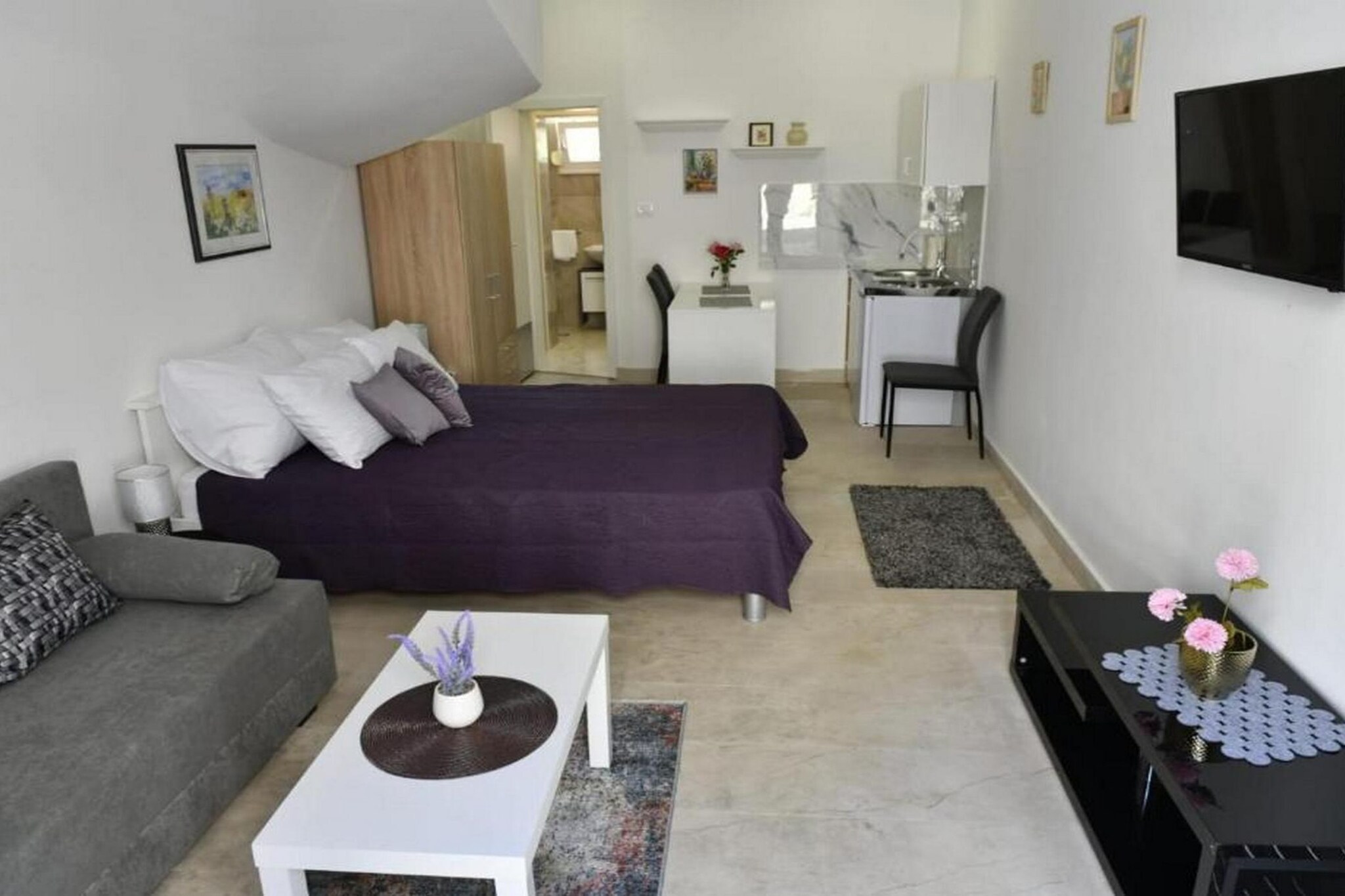 Charming Sinj Town Studio Apartments is a collection of accommodation options located in Sinj, a small town in Split-Dalmatia County in Croatia.
The apartments are suitable for solo travelers, couples, and small families looking for a home-like atmosphere while exploring the region.

Note:
Pets are allowed.
Private parking and reservation are not required.
Free Wi-fi is available throughout the property.

This Charming Sinj Town Studio Apartments   accommodate up to three guests. It features a TV and is combined with a living room and kitchen. The private bathroom is equipped with a shower and toilet.

Thanks to its excellent location, everything you'll need for your vacation is just a short walk away from the property. Caffe / bar- 15.00 m , Restaurant- 100 m,   Market -45.00 m  .The beach is 35 km away from the property.

The airport is 48 km away from the property.