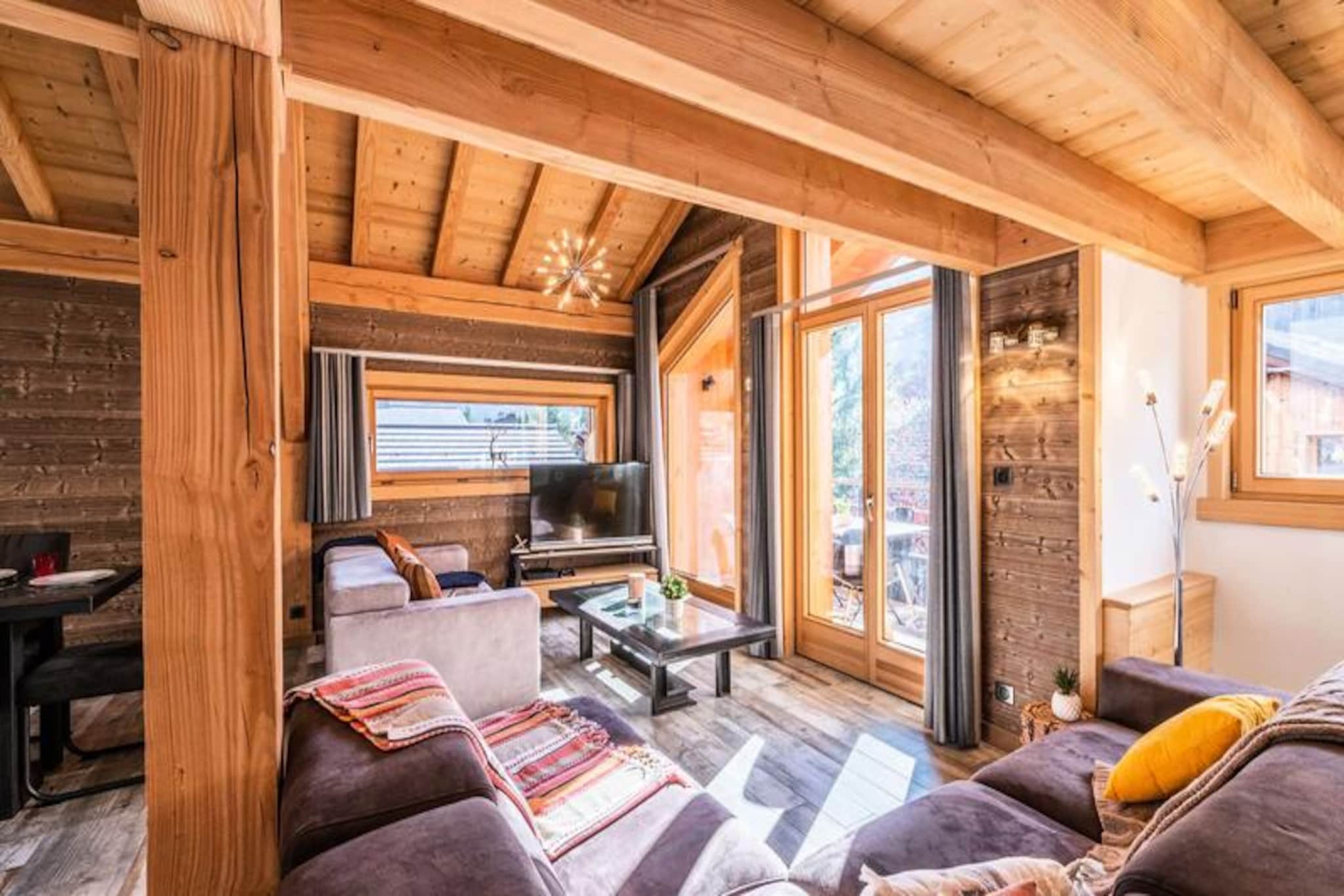 Located in the heart of Morzine, L'Etoile is a small, high-end residence offering a spacious duplex apartment perfect for families or groups of up to 11 people. Just 300 meters from the ski lifts, the apartment provides easy access to both the slopes and the lively town center. The apartment spans two levels, with the second floor featuring an open-plan living area, fully equipped kitchen, comfortable lounge, and dining area, all leading out to a balcony with scenic views. Three bedrooms on this floor each have two single beds and an en-suite shower room with a WC.

In addition to the nearby ski lifts, the residence is ideally located for exploring Morzine’s shops, restaurants, and après-ski activities. During summer, guests can enjoy the nearby hiking trails and the Summer Multipass benefits. Pets and bicycles are not allowed in the apartment, ensuring a peaceful stay for all.

On the third floor, two additional bedrooms provide ample space, with one offering two single beds and the other three. A separate shower room and WC complete the upper level.
Guests can enjoy a shared relaxation room in the basement, which includes a spa, sports equipment, hammam, and shower. Additional amenities include a ski/bike room, laundry facilities, outdoor parking, and free Wi-Fi. Sheets, towels, and beds made on arrival, as well as mid-stay and end-of-stay cleaning, are all included for your convenience.

