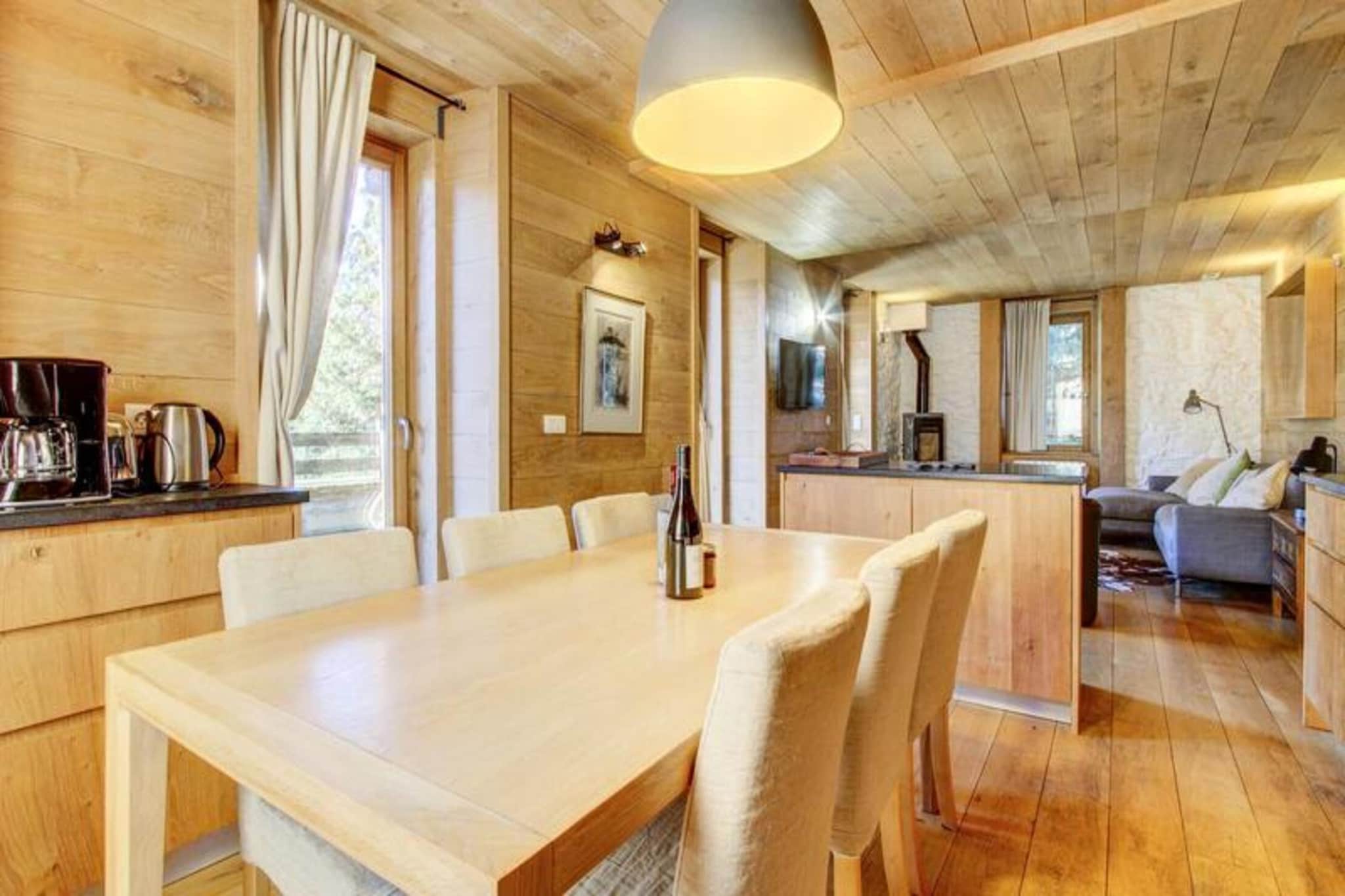 This 4-star apartment is located on the first floor of a fully renovated chalet and boasts a large 40m² terrace, perfect for enjoying the outdoors. With its contemporary design that still retains the mountain charm, the apartment offers an ideal combination of comfort and style. The apartment is within walking distance to restaurants, bars, and shops, with the Pleney ski lifts only 650 meters away and the ESF located 500 meters from the chalet. A bus stop for free shuttles is conveniently located less than 100 meters from the property, ensuring easy access to the ski lifts and surrounding areas. The apartment can comfortably accommodate up to 6 people.

The apartment's layout includes a spacious living room open to the fully equipped kitchen, complete with a wood stove and direct access to the large terrace. There are three bedrooms in total: the first bedroom features a 160cm double bed and an en-suite shower room; the second bedroom also offers a 160cm double bed, an en-suite shower room with WC, and access to a balcony; and the third bedroom contains two single beds, along with an en-suite bathroom and WC. The apartment also includes a separate WC and provides access to shared facilities such as a laundry room with a tumble dryer and washing machine, as well as a ski room with a boot dryer.

Additional amenities include private outdoor parking, sheets and towels provided, and beds made upon arrival. End-of-stay cleaning is included, ensuring a hassle-free departure. As a Summer Multipass Partner, the apartment offers exclusive benefits during the summer months. Pets are not allowed, and bicycles are prohibited inside the apartment. Please note that the tourist tax is to be paid in addition to the rental cost.