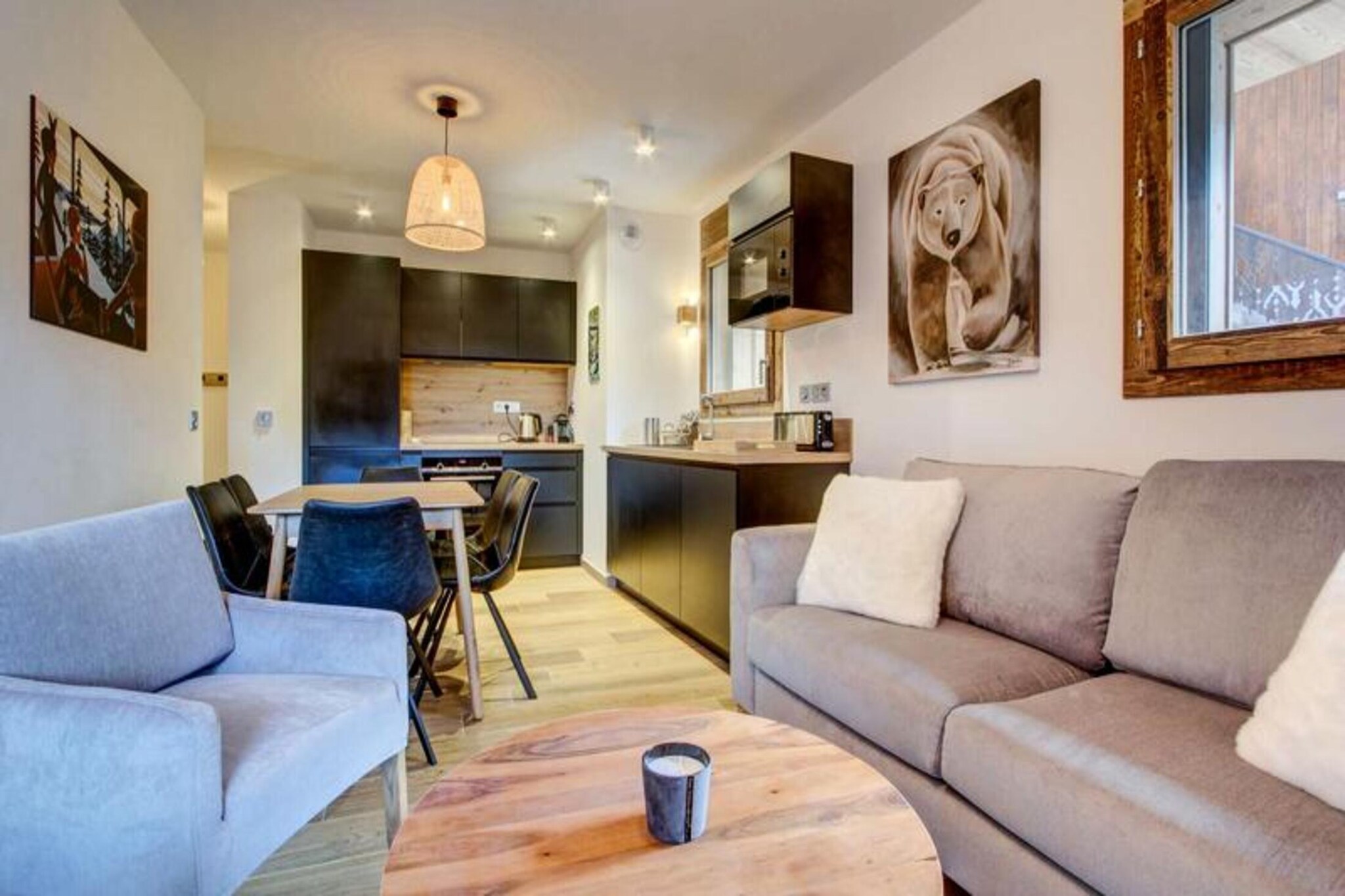 This superb two-bedroom apartment, located on the 1st floor of a new residence with an elevator, offers a comfortable stay for 4 to 6 people. Ideally situated in the heart of the village and at the foot of the Morzine-Les Gets slopes, the apartment features a spacious entrance, a living room with an open kitchen, and a dining area. The lounge area is equipped with a sofa bed (140x200) and opens onto a balcony with a view of the Pleney slopes. The first bedroom has a double bed (160x200) with access to a balcony, plus a shower room and WC. The second bedroom is equipped with two single bunk beds (80x200) and a single bed (90x200), along with a bathroom and WC. 

Additional amenities include a cellar with a shoe dryer, as well as a private parking space with narrow access (ideal for small cars). The main parking entrance allows access for vehicles up to 2.20 meters in height. For those with electric vehicles, there is a connection for charging in the basement parking. The apartment is fully equipped with sheets and towels, and beds are made upon arrival. End-of-stay cleaning is included, but a deposit and tourist tax are payable on arrival. 

The residence also provides easy access to the slopes, and guests benefit from being a Summer Multipass member, granting access to a variety of local activities during the warmer months. Pets and bicycles are not allowed in the apartment. The apartment is equipped with heating to ensure comfort throughout the stay.