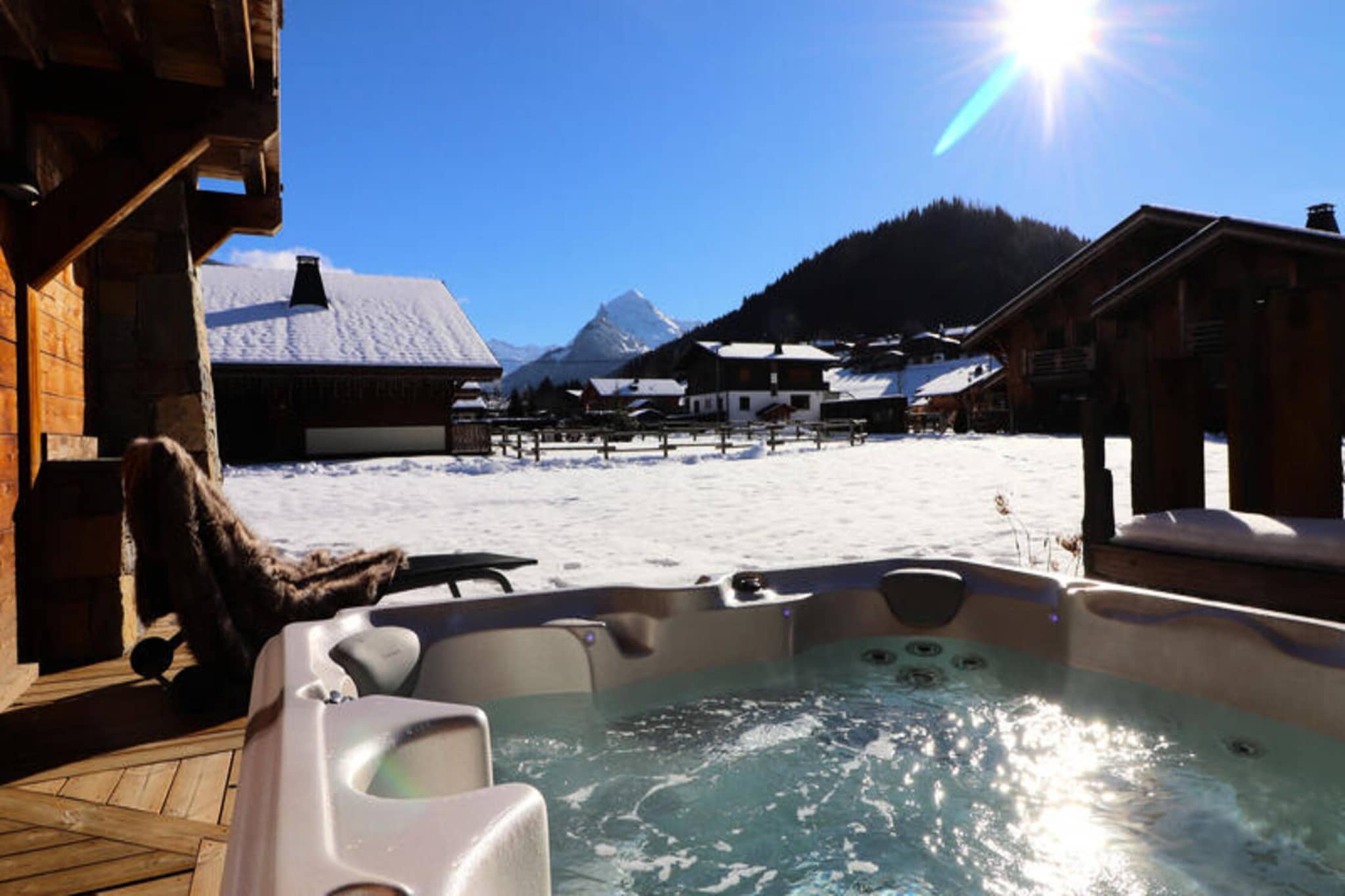 Located in the heart of the Portes du Soleil, the largest ski area in Europe, this bright and spacious chalet in the Pied de la Plagne district of Morzine offers stunning 180-degree views from the village of Montriond to the Roc d'Enfer. Perfect for families, the chalet features a welcoming living room with an open kitchen, ideal for preparing meals and relaxing after a day of adventure. The property can accommodate up to 10 adults, with five comfortable bedrooms, including a master suite, and multiple bathrooms. Enjoy the outdoor jacuzzi, a large garden, and a terrace that invites relaxation amidst beautiful alpine scenery.

The chalet is ideally located to take advantage of the area's year-round activities. In winter, the vast Portes du Soleil ski domain offers 286 slopes for skiers of all levels. In the warmer months, the resort transforms into a haven for hikers, mountain bikers, golfers, and outdoor enthusiasts with options for climbing, rafting, and stand-up paddleboarding at Lake Montriond. For those looking for even more adventure, activities like canyoning, fishing, and swimming are available nearby.

Guests also benefit from additional services such as airport transfers, ski equipment rentals, and home chef options. Enjoy a relaxing and action-packed stay with everything Morzine has to offer just outside your doorstep.