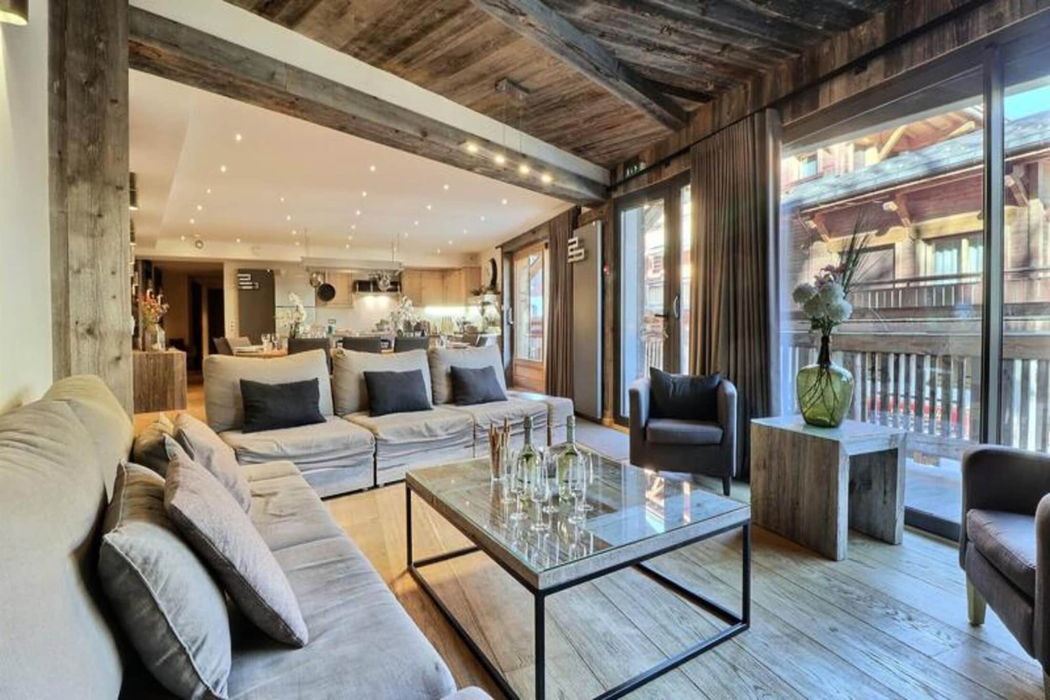 Nestled in the heart of Morzine, within the renowned Portes du Soleil ski area, L’Altachic offers an exceptional alpine retreat for both winter and summer enthusiasts. With its prime location, this charming chalet-style apartment allows you to explore everything on foot, offering easy access to the village's vibrant amenities, ski slopes, and a wealth of activities. Morzine is part of the largest ski area in Europe, featuring 286 slopes perfect for all skill levels. In summer, the area transforms into a haven for outdoor lovers, with opportunities for hiking, mountain biking, trail running, and more. Guests can enjoy the benefits of the Multipass, offering discounted access to various activities such as swimming, rafting, and stand-up paddleboarding on Lake Montriond.

Morzine offers year-round activities, from skiing and snowboarding in the winter to mountain sports and exploring the charming village in the warmer months.

L'Altachic blends traditional Savoyard charm with modern comfort, featuring three beautifully designed en-suite bedrooms, including a family room and a children’s room. The open-plan kitchen, dining, and living area is perfect for socializing, and the apartment’s balcony offers stunning views of the surrounding mountains. Additional amenities include a ski room, laundry, and a covered parking space. After a day of adventure, relax and enjoy traditional Savoyard dishes in a cozy, inviting atmosphere.

