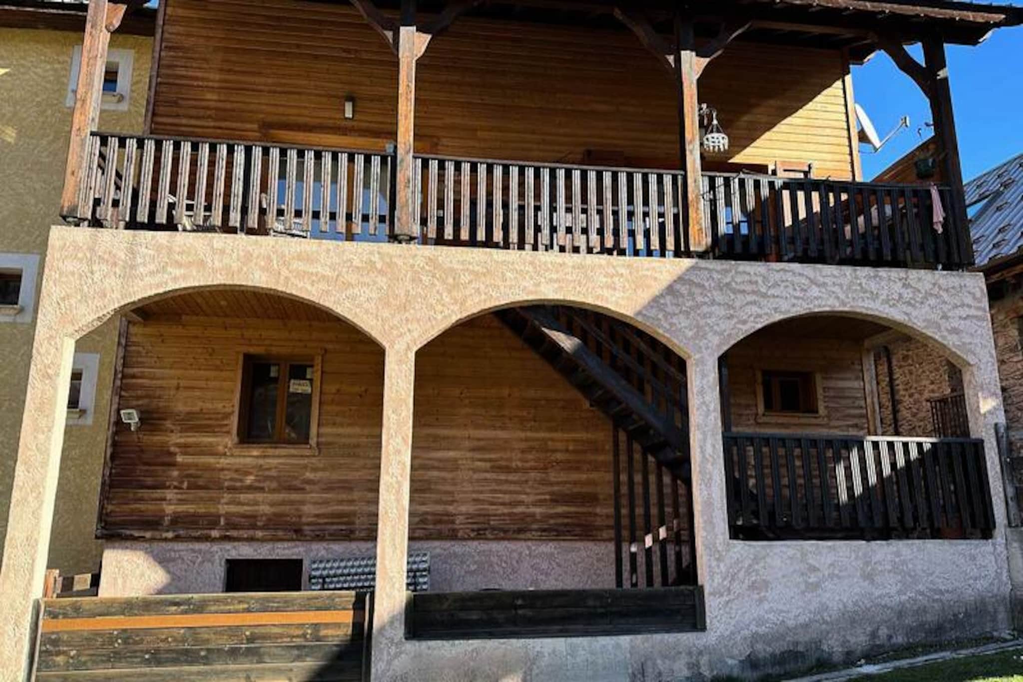 This property, along with its generous space, offers a 100 m² apartment designed for up to 10 guests. The living area includes a large central dining table, perfect for group meals, and a sofa for relaxation with a television for entertainment. Sleeping arrangements include a dormitory with two bunk beds, a single bed, and a double bed, along with two additional double bedrooms. A pull-out sofa is also available in one of the rooms. The apartment features a west-facing terrace with stunning views of the Sainte-Marie mountains. Pets are not allowed, and the property is non-smoking. Household linen is available for an additional fee, and end-of-stay cleaning is not included.

Located in the quiet village of Vars Sainte Marie, the property offers easy access to the ski lifts with free shuttles running every 15 to 20 minutes to the Col de Vars. The residence is situated just after the tourist office and within walking distance of essential services like the post office and town hall. In winter, skiing and snowboarding are right at your doorstep, while in summer, hiking trails and mountain biking paths are nearby. Public transport and shuttle services are easily accessible, and the nearest airport is a short drive away, ensuring smooth access to the property.

The apartment includes a fully equipped kitchen with modern appliances such as a washing machine, dryer, microwave, toaster, traditional oven, dishwasher, and both a SENSEO and filter coffee maker. Guests can enjoy fondue and raclette with provided sets, making it ideal for cozy meals after a day on the slopes. The apartment also has a ski room for easy storage. With its practical amenities, breathtaking views, and serene location, this property provides a perfect base for both relaxation and adventure.