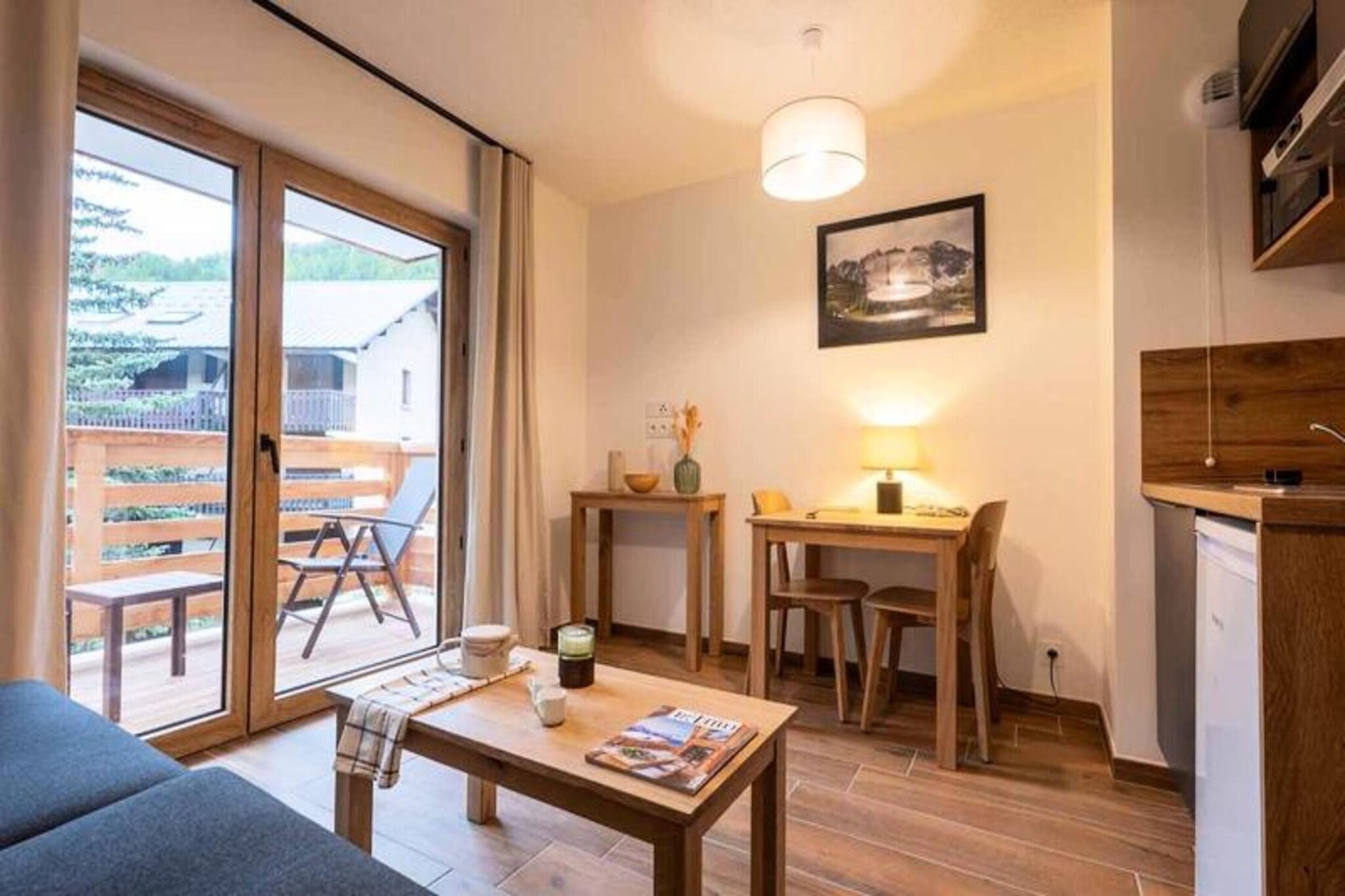 This cozy studio, ranging from 20 to 25 m², offers a perfect retreat for those seeking comfort and convenience. The living area includes a comfortable sofa bed, ideal for relaxation or accommodating extra guests. The fully equipped kitchenette allows for easy meal preparation, while the bathroom or shower room and separate WC ensure privacy and comfort. A private balcony provides a lovely space to enjoy the fresh air and views of the surroundings.

Located in a prime area, this studio is close to various attractions, making it a great base for exploring. Whether you’re in the mood for outdoor adventures or local sightseeing, you'll find plenty to do. The nearby slopes offer fantastic skiing or snowboarding opportunities in winter, while in the warmer months, hiking and biking trails await. 

Shops, restaurants, and cafes are also just a short walk away, allowing you to easily immerse yourself in the vibrant local atmosphere.