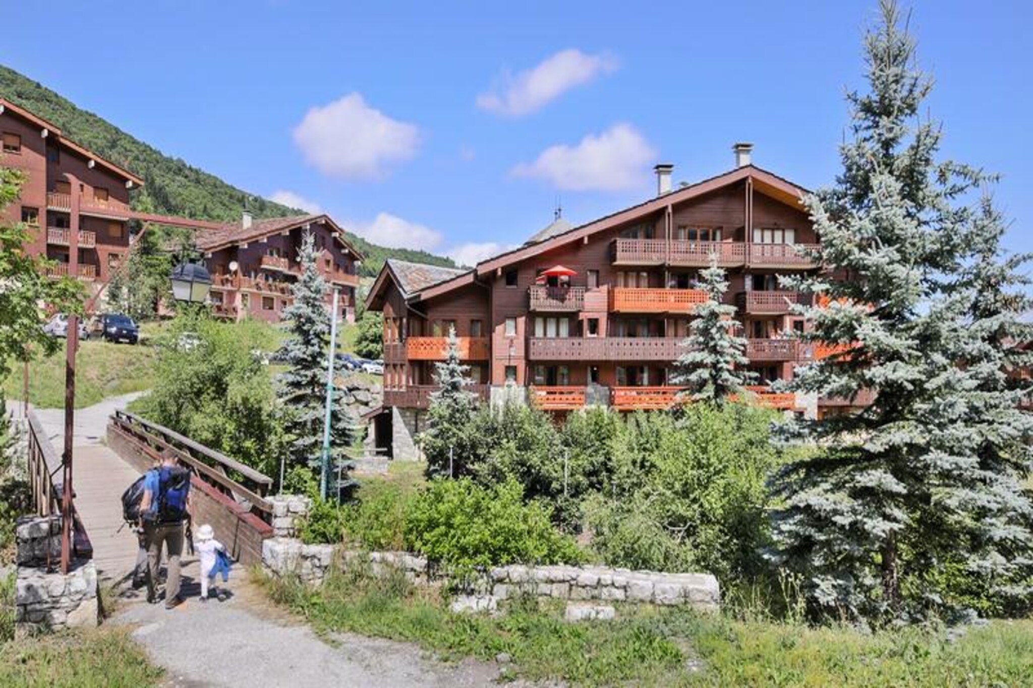 Property along with a functional layout offers a 32m² vacation rental, ideal for up to 4 people. The apartment includes a living room with a sofa bed and trundle bed, allowing for flexible sleeping arrangements. There is also a double bedroom for added comfort. Guests can enjoy a private balcony with a mountain view, facing north. While pets are not allowed, additional services such as Wi-Fi, baby equipment, and daily housekeeping are available for an extra charge. The rental is located on the first floor and includes a mandatory end-of-stay cleaning service, with linens and towels available for an additional fee.

The residence is ideally located in the La Forêt district of Valmorel, a pedestrian-friendly area just 100 to 500 meters from the nearest slopes, shops, and activities, making it a convenient base for both winter and summer vacations. The surrounding landscape offers a peaceful setting with views of green nature and mountain peaks. The nearest ski lift is only a short walk away, and the residence is easily accessible by foot from the village center. Local amenities, including a variety of shops, are just 5 minutes away on foot, ensuring convenience for guests.

The apartment features an American-style kitchen equipped with essential appliances, including a fridge, hob, microwave, and oven, allowing guests to prepare meals during their stay. The bathroom is well-equipped with a bathtub, electric towel dryer, and sufficient storage space. The apartment also benefits from the Maeva Home Selection label, ensuring quality and up-to-date amenities. Guests have the option to reserve parking for an additional fee, with covered parking available during the summer months.