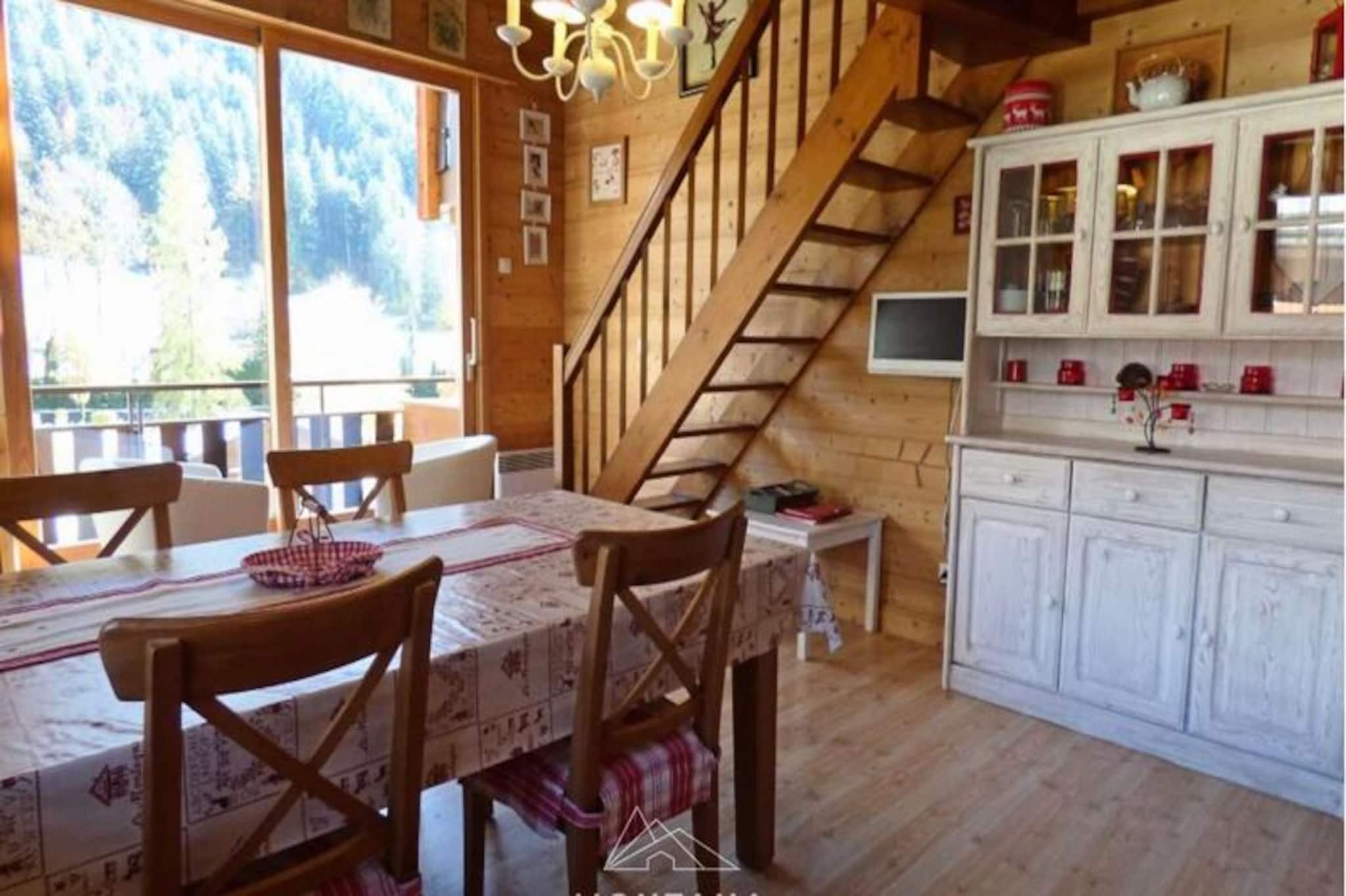 This charming apartment is located in the residence in Grand Bornand, offering a spacious and comfortable retreat for up to 5 people. Situated just 200 meters from local shops and 1 km from the cable cars, with a free shuttle stop only 50 meters away, the apartment is ideally positioned for both winter and summer activities. 

The apartment’s location also provides easy access to outdoor recreation, including the nearby fitness trail and scenic hiking opportunities. In the winter, Grand Bornand is renowned for its ski slopes, while in the warmer months, guests can enjoy mountain biking, hiking, and exploring the beautiful Aravis range. The charming village of Grand Bornand is only a short distance away, offering restaurants, shops, and local attractions. Additionally, Annecy (32 km), Geneva (52 km), and Lyon (155 km) are within easy reach for those seeking day trips or further exploration.

The accommodation features a fully equipped kitchen that opens to a cozy living room, a bedroom with a double bed, and a mezzanine with two single beds and a convertible sofa, providing ample space for a family or small group. A bathroom with a bathtub and separate WC add to the convenience. The large south-facing balcony offers stunning views of the river and surrounding mountains.