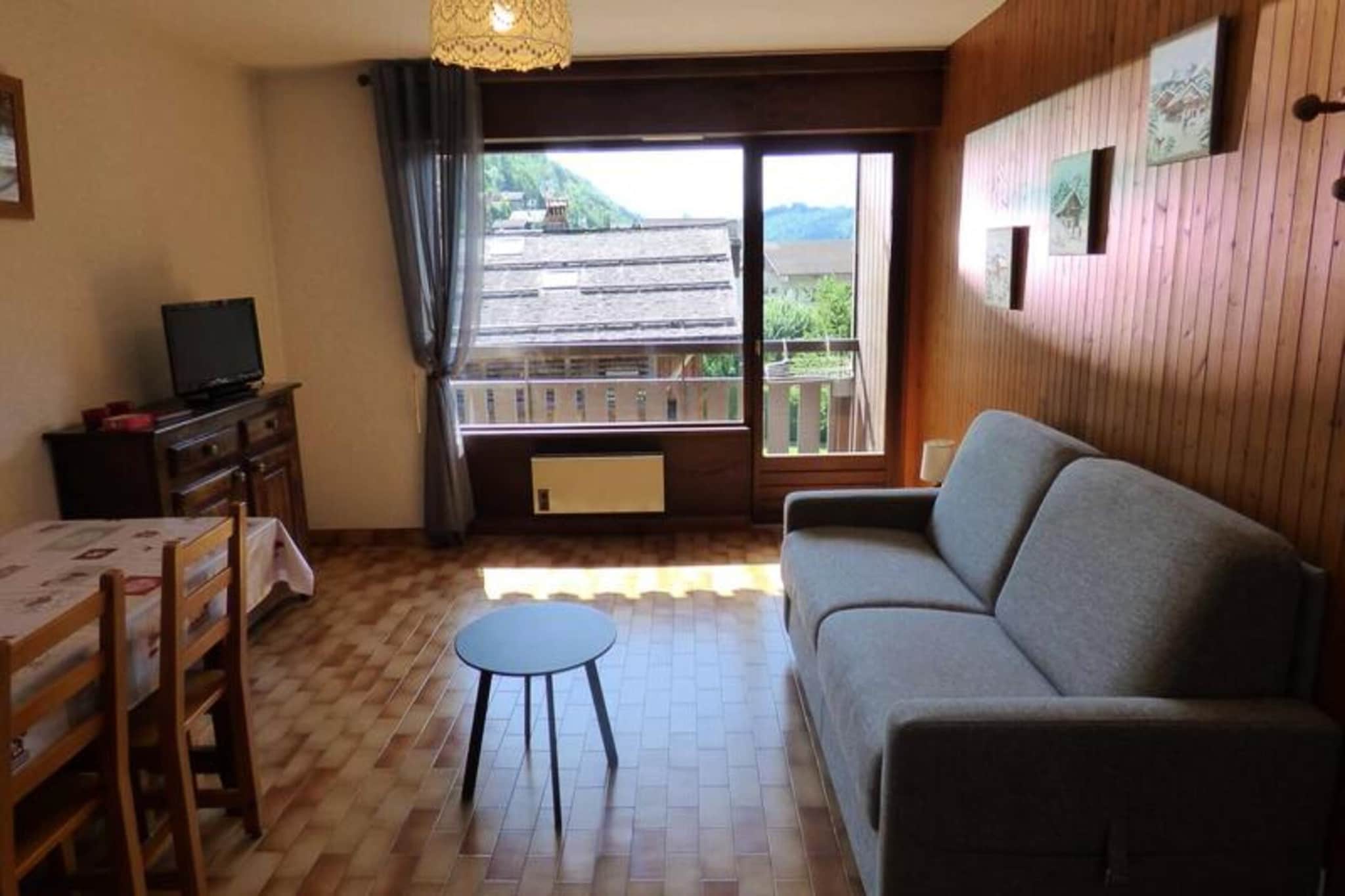 Property, along with its cozy and functional design, accommodates up to 4 guests in a 31.5m² studio-cabin combination. The living room is furnished with a rapido sofa that converts to a bed, ideal for a restful night's sleep. The cabin includes two sets of bunk beds, each measuring 80 cm, making it perfect for families or small groups. The apartment also offers a balcony with a west-facing exposure, allowing guests to enjoy the surrounding views. Please note that sheets and towels are not provided, can only be arranged for an additional charge, and pets are not allowed. Guests can also expect to pay the tourist tax on-site, and additional services, such as rental of bedding, can be arranged through the agency.

The location of the property offers convenient access to nearby attractions, making it an excellent base for both winter and summer activities. It is situated just 1km from the cable cars, providing easy access to skiing during the winter and hiking trails in the warmer months. The property is 250m from local shops for everyday essentials and only 50m from the ski bus stop, enhancing accessibility to the ski areas and the village center. Additionally, the property is well connected by major travel routes, with Annecy SNCF train station located 32 km away and Geneva Airport 52 km from the property. For those coming from further afield, Lyon Airport is 155 km away, providing options for international travelers.

While the accommodation does not specify a full kitchen setup, it is designed for short stays with comfort in mind. The bathroom features a slipper bathtub, ideal for relaxing after a long day of outdoor activities, and the separate WC offers additional convenience. The apartment is equipped with heating to ensure comfort during cooler months. Though not a self-catering property, the proximity to local shops allows guests to easily access food and essentials, making it a practical choice for those looking for a functional and well-located base for their stay.