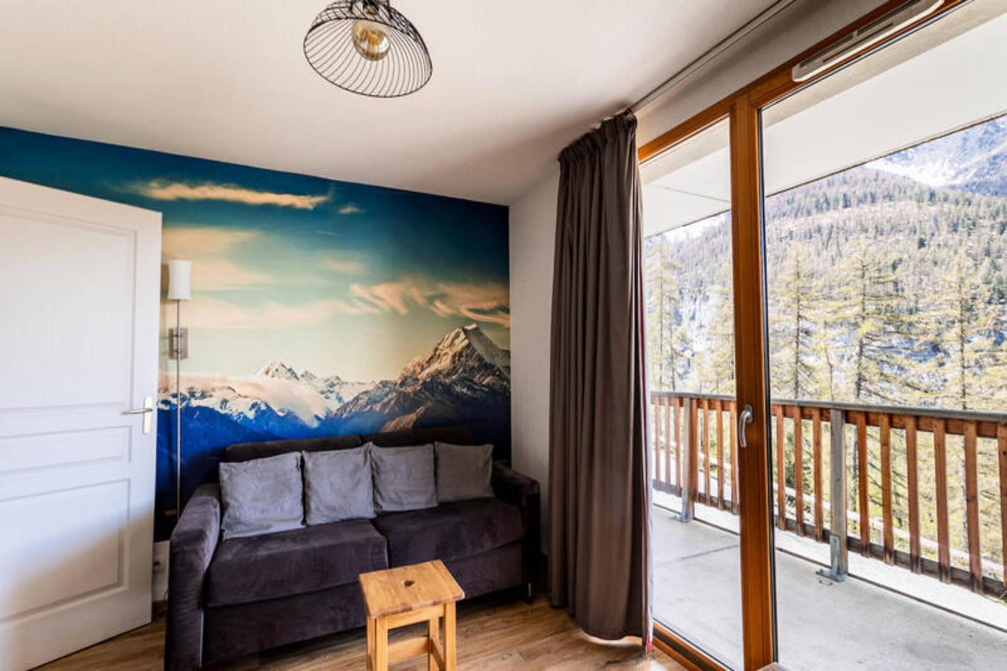 Property, along with its tranquil setting, offers a well-equipped 2-room apartment that can accommodate up to 6 guests. The apartment features a living room with a sofa bed and a separate bedroom with a double bed, while a sleeping area with two single bunk beds provides additional space. A large balcony facing northwest offers views of the surrounding peaks and valley. For convenience, the apartment includes a bathroom with a bathtub, separate WC, and a dining area. Guests can enjoy complimentary access to the heated indoor swimming pool located in a nearby building, which is available seasonally. Additional amenities like a 4G Wi-Fi box, a raclette machine, a microwave, and a hairdryer enhance the comfort of the stay. Pets are not mentioned, and additional items such as linens or housekeeping can be inquired about.
The apartment is ideally located in the heart of Les Orres 1800, just a short walk from the resort center. Ski lift ticket offices are about 50 meters away, and the slopes are only 200 meters from the apartment. Guests can easily access the main square, where they’ll find a variety of shops, restaurants, bars, a mini-market, and equipment rental stores, all within a 250-meter radius. Outdoor enthusiasts will appreciate the proximity to hiking trails, making the property suitable for both winter and summer activities. The resort is perfect for guests looking for a relaxing yet well-connected stay in the mountains, offering a variety of activities right at their doorstep.
The apartment includes a fully equipped kitchen, ideal for self-catering, with a range of appliances such as a kettle, toaster, filter coffee maker, and an Italian coffee maker. The kitchen is designed to support the needs of active guests, providing the necessary tools for preparing meals after a day of outdoor activities. For additional comfort, the property is equipped with heating and a vacuum cleaner. With the inclusion of kitchen utensils and modern amenities, this apartment provides a homely and convenient retreat in the heart of the Les Orres resort area.