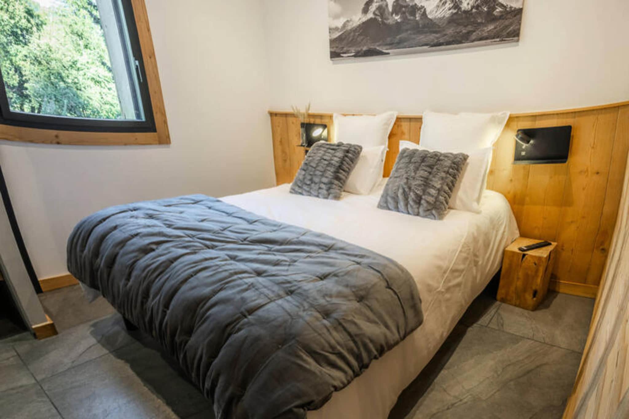 A property with a luxurious and modern design, this well-appointed holiday home offers accommodation for up to 8 guests. Featuring two double bedrooms with comfortable 160 x 200 cm beds and a dedicated sleeping area with 4 single bunk beds designed for children, this property combines functionality and style. Guests can relax in the welcoming living room, which opens onto a sunny south-facing terrace with views of La Mazelière. The living space includes a connected television (Netflix, Prime Video, YouTube), an electric fireplace, and very high-speed internet. The property also offers para-hotel services such as bed linen, end-of-stay cleaning, and beds made on arrival, ensuring a smooth and stress-free experience. Parking is convenient with three spaces available directly in front of the chalet, two of which are equipped with GreenUp sockets for electric or hybrid vehicles.
Perfectly situated at an altitude of 1,600 metres, this property offers excellent proximity to the Les Orres ski area, with easy access via the free shuttle service that stops just steps from the chalet. Guests can explore the heart of the resort, which offers shops, local restaurants, and entertainment options. During the summer months, visitors can visit the resort's heated outdoor swimming pool, just a few minutes’ walk via a scenic pedestrian path. Convenient transport options are nearby, making the chalet an ideal choice for families and groups looking to enjoy both summer and winter activities in a serene mountain environment.
The kitchen combines modern appliances with practicality, including a Nespresso coffee machine, toaster, kettle, dishwasher, combined microwave oven, freezer, and a washing machine with dryer. Guests can gather for cozy dinners using the fondue or raclette machines provided. The dining area seats up to 8 people, creating a welcoming space for shared meals and memorable family evenings. Additional amenities include a ski box for equipment storage, underfloor heating throughout the property, and modern bathrooms with walk-in showers and heated towel rails. With thoughtful touches and a stylish alpine ambiance, this property offers guests both comfort and convenience.