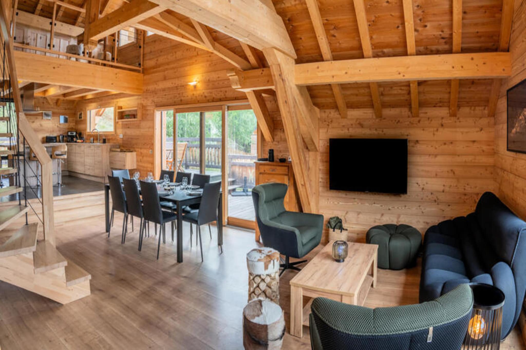 Property, along with its spacious design, offers a luxurious 205 m² mountain chalet that comfortably accommodates up to 15 guests. The chalet features a variety of sleeping arrangements across multiple levels, including double beds, single beds, and bunk beds. There is a large living room equipped with a television, fiber Wi-Fi, and Bluetooth speaker, as well as a dining area that can seat 15 guests. The chalet boasts a south and west-facing balcony with stunning views, perfect for relaxing during summer evenings. While pets are not allowed, additional services such as linen, bed-making on arrival, and end-of-stay cleaning are included in the rental. The property does not mention free activities, but it offers a free shuttle service to the resort center every 10 minutes.
Located at 1,550 meters in the peaceful Pramouton district, this chalet is ideally positioned for both winter and summer activities. The Les Orres ski area is easily accessible with ski lifts just 350 meters away, while a free shuttle will take you to the heart of the resort, where you can enjoy a variety of activities, entertainment, and local amenities such as bakeries, restaurants, and bars. In summer, the nearby heated outdoor swimming pool offers panoramic views of the Embrunais Valley and Lake Serre-Ponçon. The location also offers picturesque views of the surrounding mountains, making it a perfect destination year-round.
The chalet’s kitchen is fully equipped for preparing large family meals, with a dishwasher, wine cellar, oven, microwave, washing machine, and various small appliances such as a coffee maker, kettle, toaster, and mixed coffee maker. The open kitchen seamlessly connects to the spacious living area, making it perfect for socializing while cooking. The chalet also features a cozy reading corner, darts, and a chessboard for added entertainment. For added convenience, three bathrooms with showers and three separate toilets are available. The property’s interior is designed with natural light and LED lighting, creating a warm, inviting atmosphere throughout the chalet.