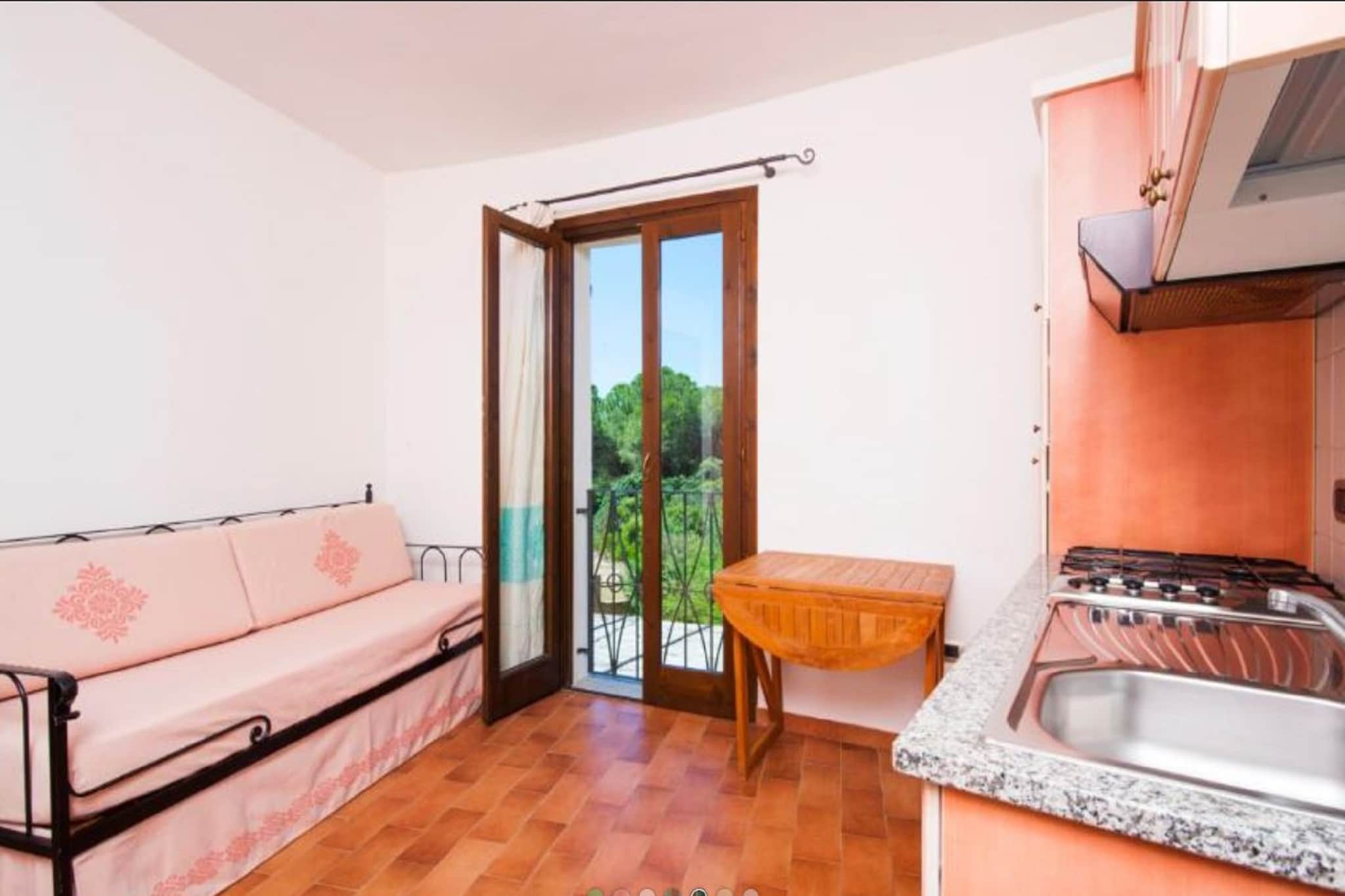 Ground floor: (open kitchen(hob, hood, espresso machine, fridge), Living/diningroom(TV), Bedroom with bathroom(double bed, shower, washbasin, toilet, bidet), veranda, air conditioning)\n\nOn the 1st floor: (open kitchen(hob, hood, espresso machine, fridge), Living/diningroom(double sofa bed, TV), bedroom(double bed), bathroom(shower, washbasin, toilet, bidet), air conditioning)\n\ngarden furniture, sun loungers, parking, parasol, swimming pool(shared with other guests)