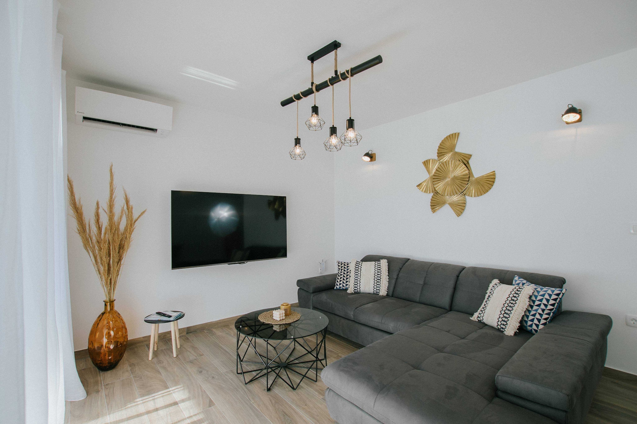 Spacious Luxury Trogir Apartments in Trogir, Split-Dalmatia County, Croatia, is a luxurious Apartments offering modern amenities such as free Wi-Fi, air conditioning, a fully equipped kitchen.  It features stylish interiors, spacious living room, and outdoor furniture with beautiful views. Located near the historic town of Trogir, the villa is ideal for families, couples, and groups seeking a serene and comfortable retreat while exploring the Adriatic coast and its cultural landmarks.

Note:

Private parking is available, reservation is not required.
Wi-Fi is available throughout the property.
Pets are not allowed.

This two-bedroom apartments can accommodate up to four guests. It features an internet-enabled/flat-screen TV and is combined with a living room seating area, sofa, and kitchen. The private bathroom is equipped with a shower and toilet.

Thanks to its excellent location, everything you'll need for your vacation is just a short walk away from the property. Grocery stores, Pharmacy, cafes, restaurants—everything is within a 250.00 m radius.

The airport is 4 km away from the property.