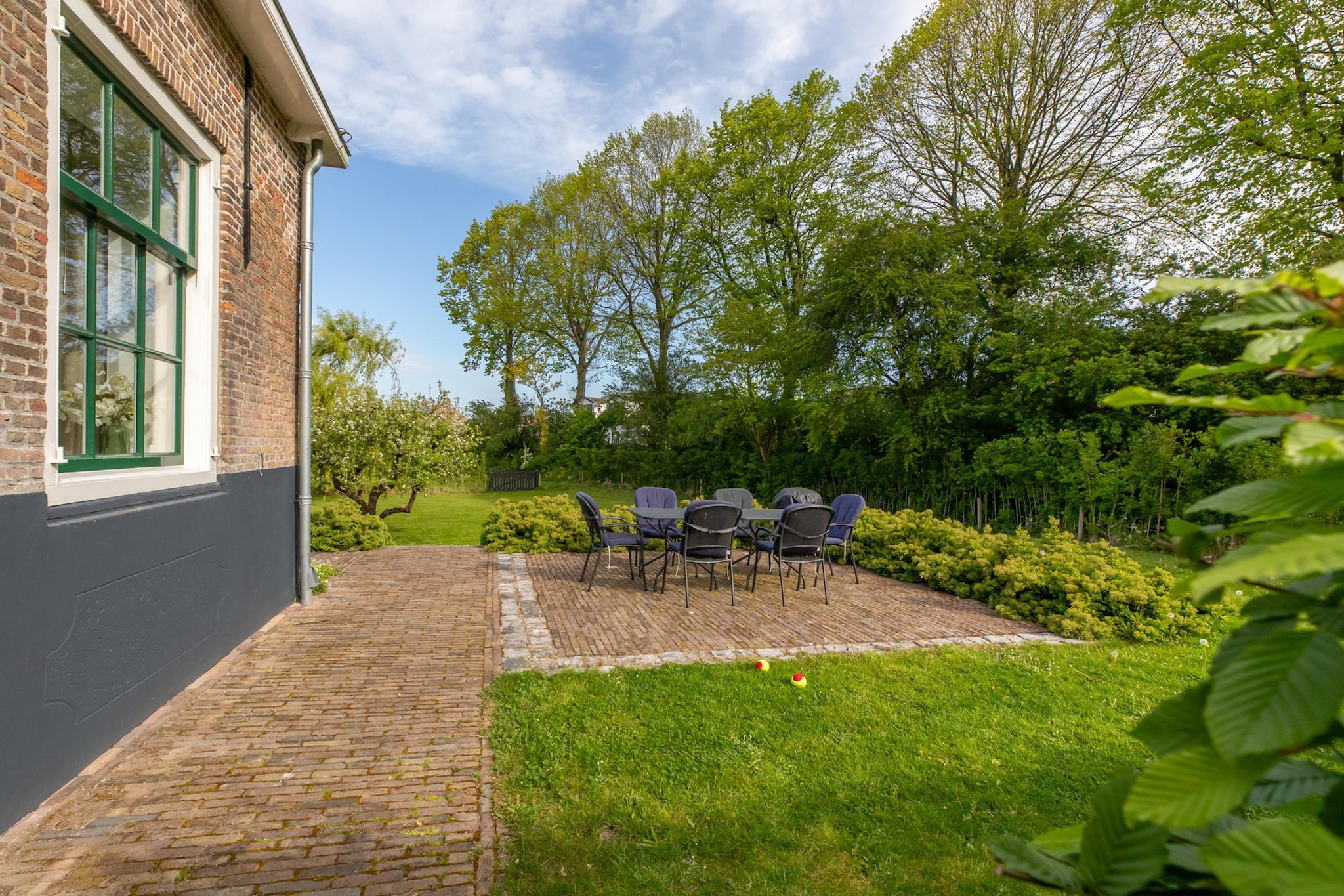 Vakantiehuis 'Boerderij Molenhof' - Stationsweg 5  Heinkenszand - Buitenkant zomer