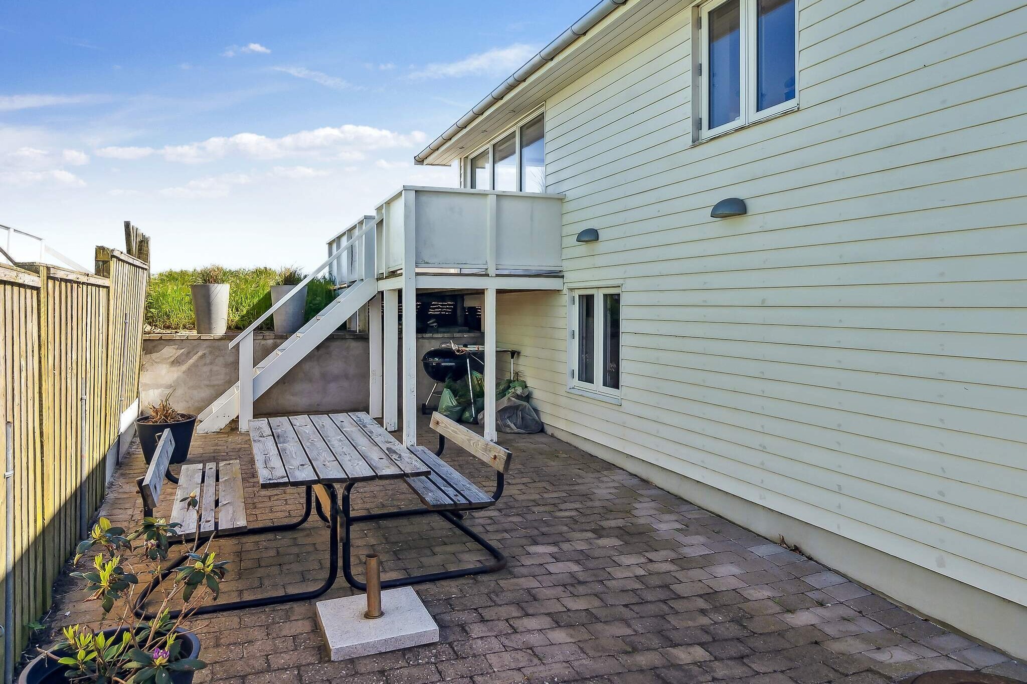 Kitchen(cooker(electric), coffee machine, microwave, dishwasher, fridge-freezer), Living/bed room(single sofa bed, TV, stereo unit), bedroom(double bed), bedroom(double bed), bathroom(washbasin, shower, toilet, washing machine), heating(electric), garden furniture, air to air heatpump