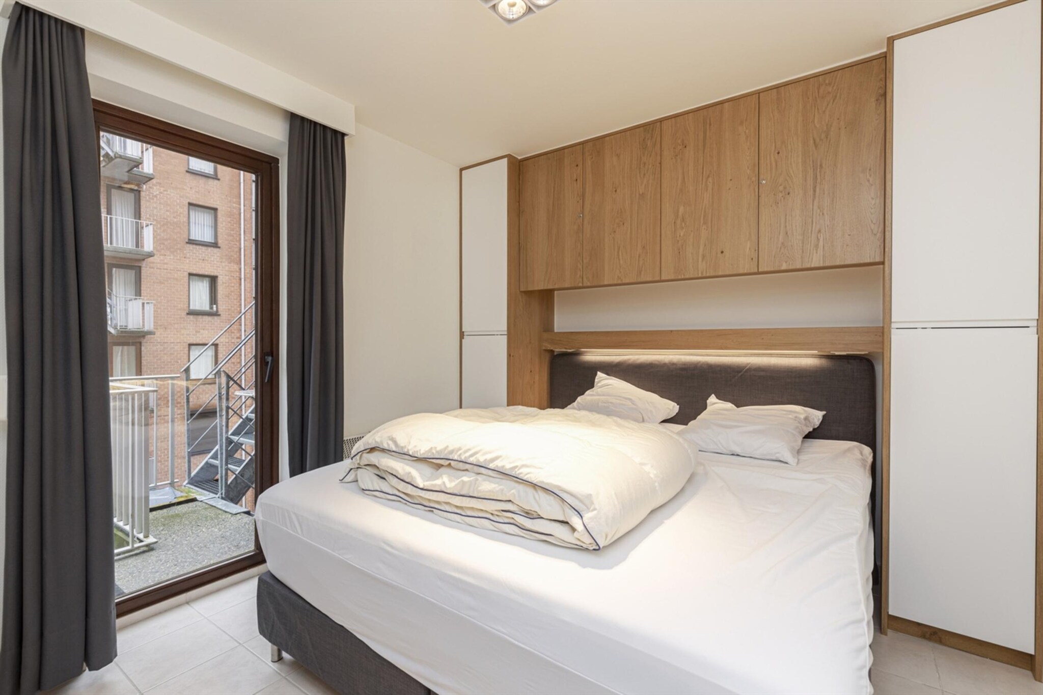 On the 5th floor: (hall(toilet), Living room(TV(flatscreen, digital), dining table, seating area, radio), open kitchen(hob, electric kettle, toaster, coffee machine(espresso), oven, dishwasher, fridge-freezer), bedroom(double bed(two single duvets, 180 x 200 cm)), bedroom(double bed(two single duvets, 180 x 200 cm)), bathroom(shower, washbasin), Internet access)\n\nbalcony, heating(electric), terrace, garden furniture, parasol, lift