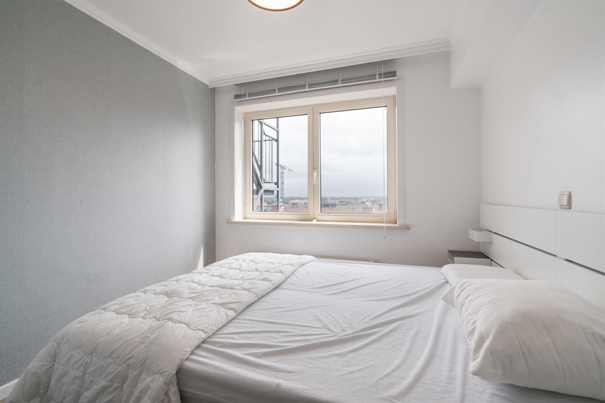 On the 8th floor: (hall(toilet), Living room(double sofa bed, TV(digital, smart TV), dining table), open kitchen(hob(induction), electric kettle, toaster, oven, dishwasher, fridge-freezer), bedroom(double bed(160 x 200 cm)), bedroom(bunk bed(90 x 200 cm)), bathroom(shower, washbasin), Internet access)\n\nwashing machine, balcony, heating(gas), terrace, lift, iron