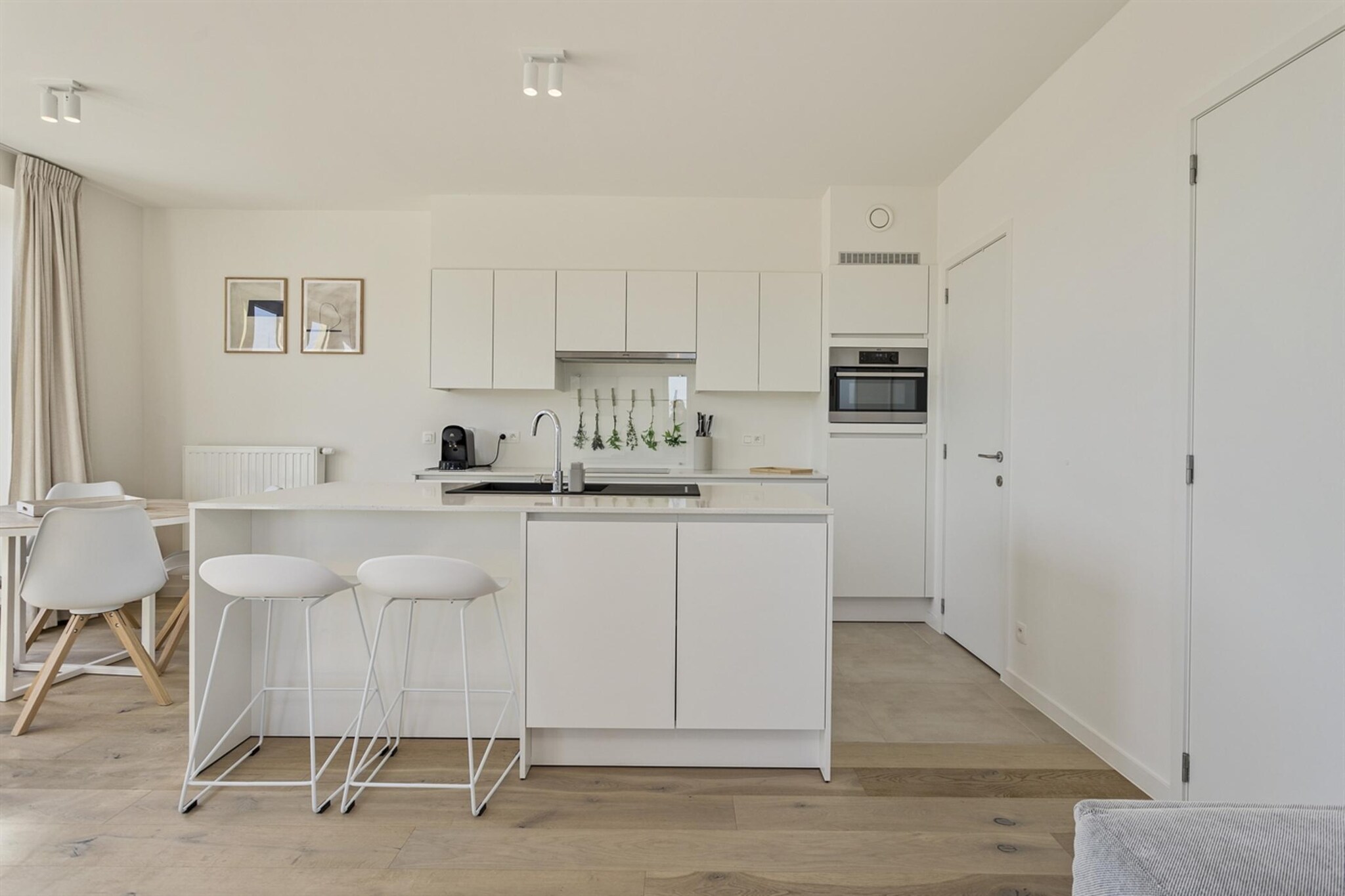 Ground floor: (Living room(TV, dining table, seating area), open kitchen(hob(electric), toaster, coffee machine(espresso), microwave, dishwasher, fridge-freezer), bedroom(double bed(160 x 200 cm)), bedroom(single bed(90 x 200 cm), single bed(90 x 200 cm)), bathroom(shower, washbasin, toilet))\n\nbalcony, heating(gas), terrace, garden furniture, parasol, lift