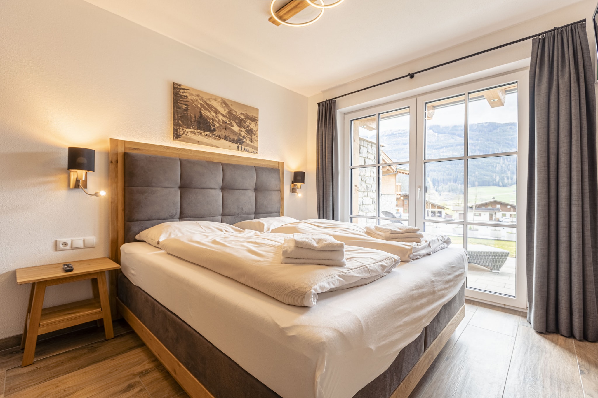 On the 1st floor: (bedroom(double bed, TV), bedroom(double bed, TV), bedroom(double bed, TV), bedroom(double bed, TV), bathroom(shower, washbasin, toilet), bathroom(shower, washbasin, toilet), bathroom(shower, washbasin, toilet), Internet access)\n\nOn the 2nd floor: (open kitchen(hob, electric kettle, toaster, cooker, hood, coffee machine, microwave, dishwasher, fridge-freezer), Living/diningroom(TV, dining table, seating area))\n\nGarden Furniture , cot, sauna, balcony, heating, terrace, garden, parking, high chair, hairdryer, Charging post for electric cars