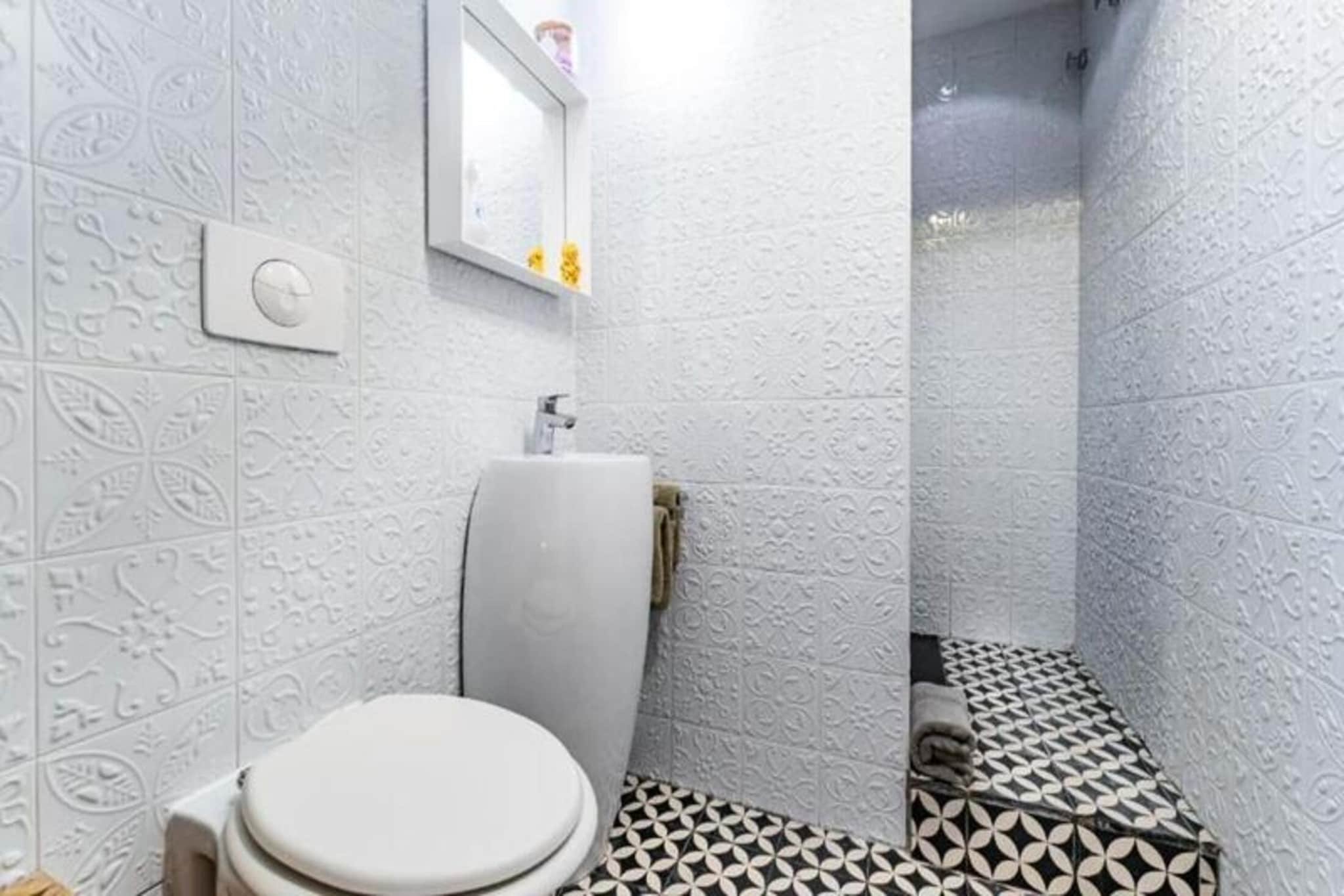 Property along with a chic and elegant ambiance offers a recently renovated apartment in the heart of Bordeaux's historic district. Just steps away from museums, theaters, cinemas, restaurants, and shops, the apartment features high-end amenities, including a Nespresso coffee machine, Bluetooth speaker, flat-screen TV with Chromecast, and a remote-controlled candle. Guests can relax on a private terrace. A 250-euro deposit is required, securely processed via Swikly.

Situated in a quiet 18th-century building, the apartment is in a vibrant yet calm neighborhood with easy access to Bordeaux’s cultural and historical attractions. It’s conveniently located near Mérignac Airport and St Jean Station, with a public car park 150 meters away and free street parking at select times. This location offers a chance to explore Bordeaux, a UNESCO World Heritage Site known for its lively atmosphere and rich history.

Guests also have access to a breakfast delivery service. Bordeaux, famed for its wine culture and modern vibrancy, offers the perfect base for exploring its elegant streets and cultural scene.