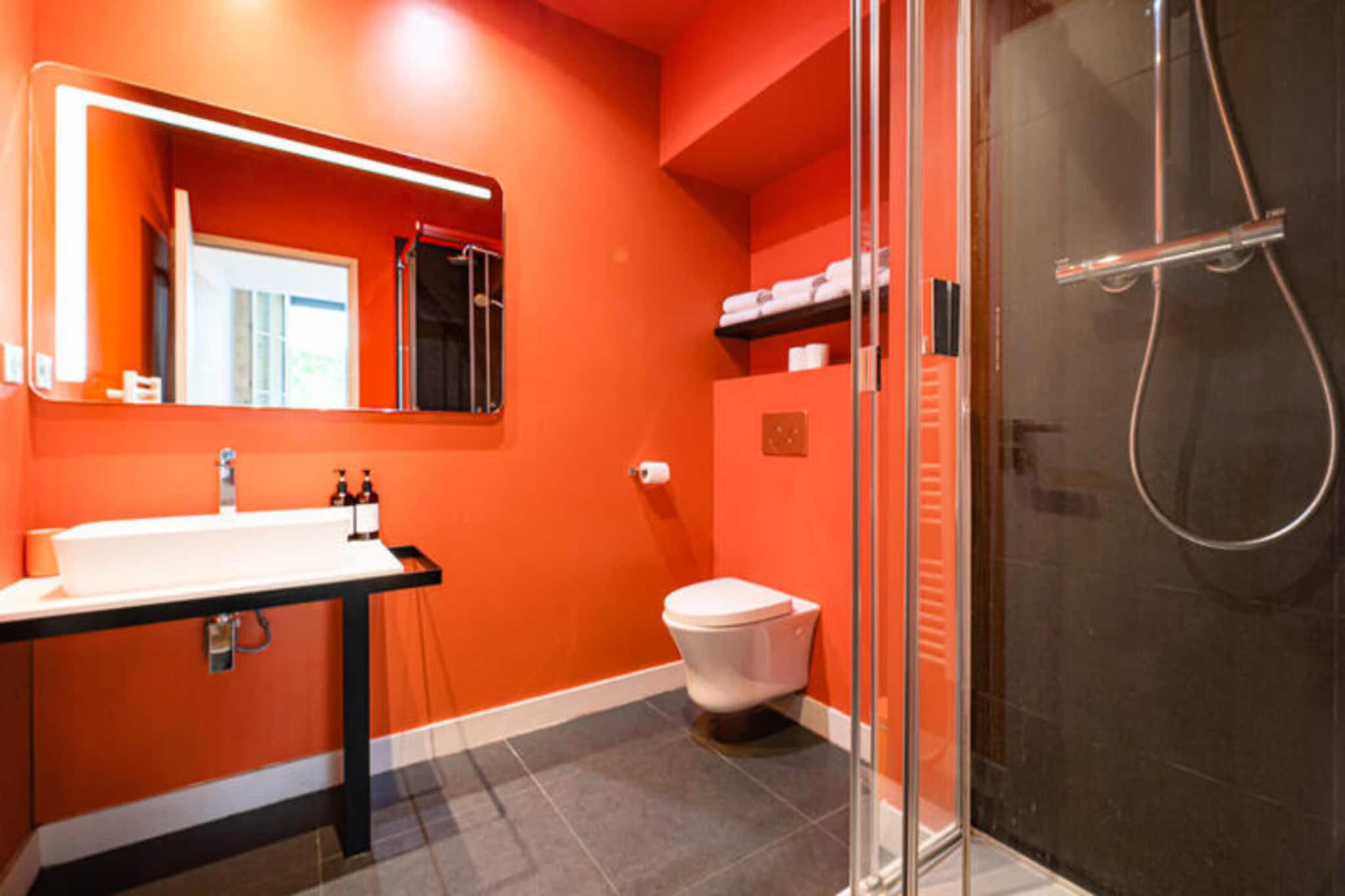 This quiet, furnished apartment of 63 m², located on the 1st floor (without an elevator), offers a comfortable and stylish stay in the heart of Bordeaux. The apartment is ideally situated close to the renowned Museum of Contemporary Art (CAPC) and the scenic quays along the Garonne River. With a tram station just outside, you’ll have easy access to explore the city at your own pace.

The apartment is thoughtfully designed, featuring a spacious living room with a sofa bed, two armchairs, a coffee table, TV, Wi-Fi, and a dining table for six people. The open kitchen is fully equipped with modern appliances, including an oven, microwave, dishwasher, fridge, hotplates, kettle, Nespresso coffee maker, and toaster. The two bedrooms are cozy and comfortable: one with a double bed and the other with two single beds, both with wardrobes. The two shower rooms are equipped with sinks, towel dryers, and WC. A standout feature is the large 36 m² terrace, perfect for enjoying outdoor moments.

Convenient amenities like a washer-dryer, hairdryer, and iron ensure a hassle-free stay. The apartment also provides household linen (sheets, towels, tea towels), with beds made on arrival. The vibrant city center of Bordeaux is within walking distance, where you can visit cultural landmarks, dine at fine restaurants, and shop at unique boutiques. Bordeaux is also world-famous for its wine, and the surrounding vineyards offer unforgettable wine tours.