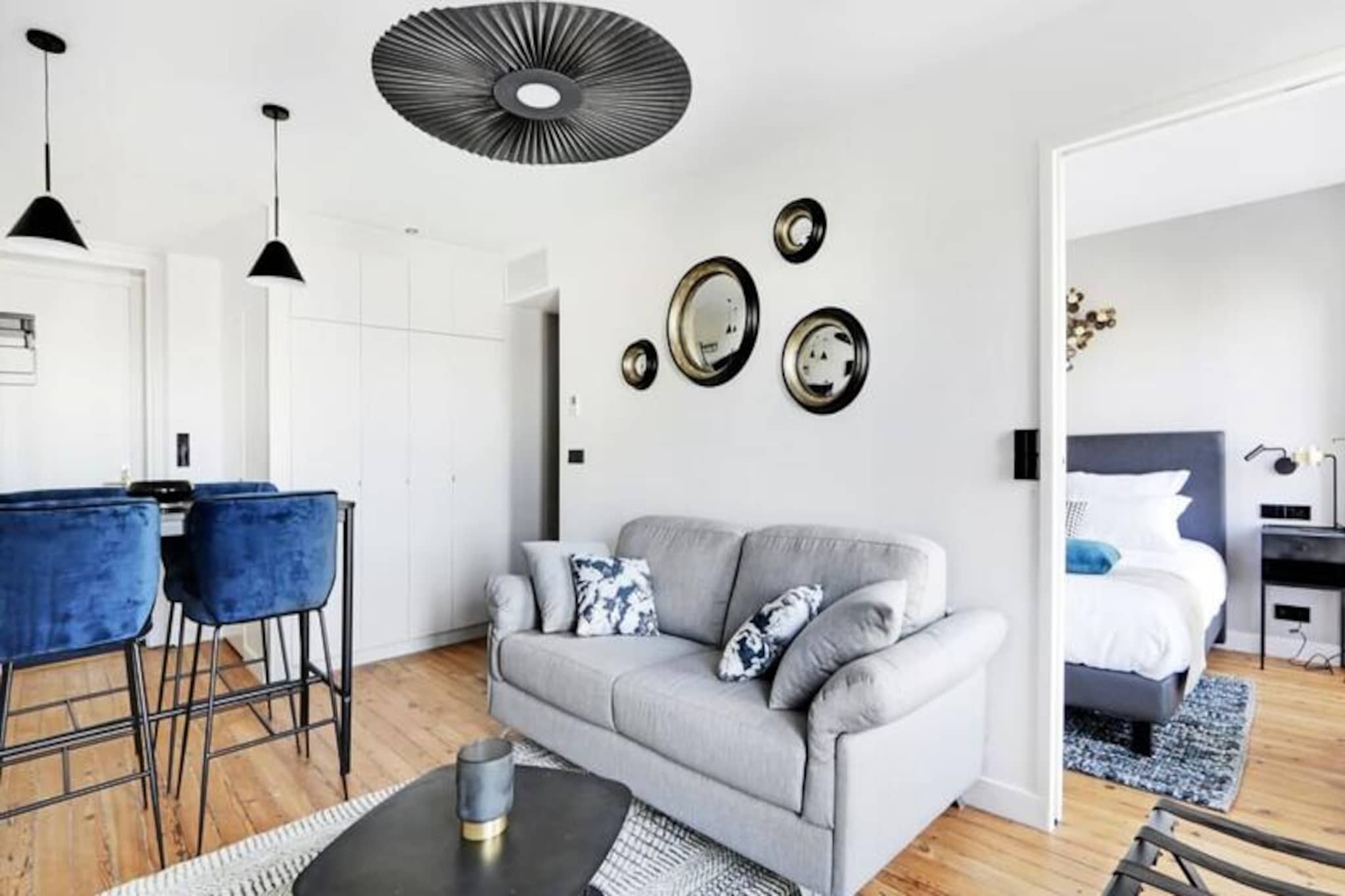 This stylish duplex suite, located on the top floor, offers a panoramic view over the rooftops of Bordeaux, making it an ideal getaway for families or friends. The space features two bedrooms, including a mezzanine-level master bedroom with a king-size bed, and a comfortable sofa bed in the living room, accommodating up to four guests. Two modern bathrooms with Italian showers and separate toilets ensure privacy and comfort throughout your stay.
The fully equipped kitchen allows you to prepare your favorite meals, which can be enjoyed around the dining table in the cozy lounge area. For your convenience, the suite includes air conditioning, a safe, satellite TV, and high-speed Wi-Fi access. The apartment is designed to offer an exceptional level of comfort and autonomy, with a connected lock system for easy, secure entry.
The apartment is situated in a chic and peaceful residential area, just a 5-minute walk from the Public Garden, perfect for leisurely strolls. The location also provides easy access to tram line C, allowing you to explore Bordeaux’s top attractions, such as the historic Place de la Bourse, the stunning Bordeaux wine shops, and the iconic La Cité du Vin wine museum. Whether you're here to enjoy Bordeaux's rich history, architecture, or local cuisine, this duplex offers an excellent base for exploring the city.