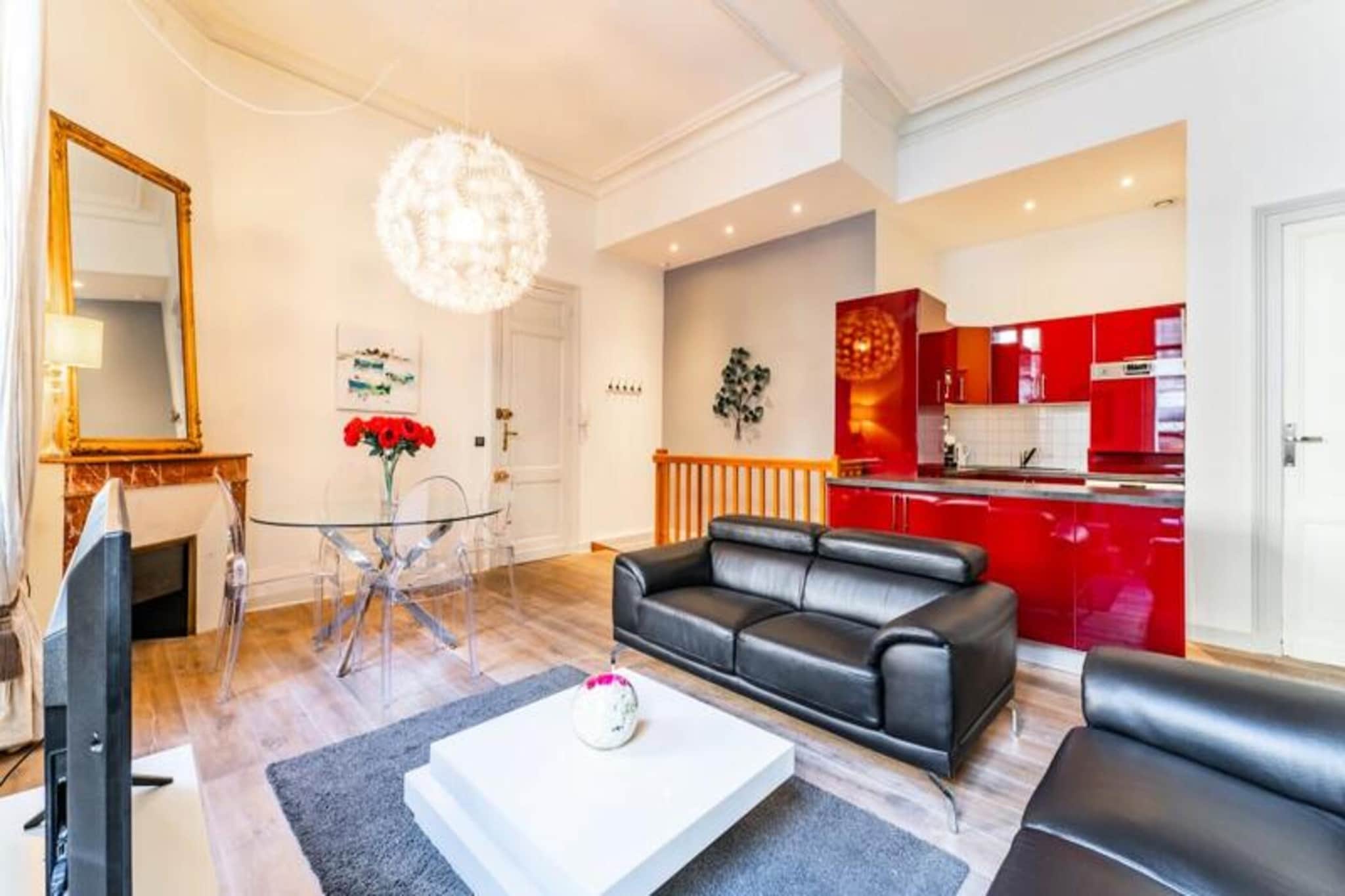 This elegant apartment is situated in the heart of Bordeaux’s historic Saint-Michel district, offering an exceptional stay steeped in charm and modern comfort. Located in a historic building, the apartment provides easy access to Bordeaux’s cultural landmarks and lively events.The spacious living area features a comfortable leather sofa, a large flat-screen TV, and high-speed fiber optic internet, ensuring a relaxing and connected experience. The dining room, with seating for four, flows seamlessly into a fully equipped open kitchen with modern appliances. Two serene bedrooms boast memory foam mattresses and ample storage, while the bathroom includes a double sink, a shower, and a hairdryer. Additional conveniences like a separate toilet, an iron, and a dressing room complete the space.
The Saint-Michel district is rich in history and vibrant urban life. Just steps from the apartment, the Basilica of Saint-Michel and its iconic bell tower dominate the area, while Place des Capucins hosts Bordeaux’s largest and oldest market. Visitors can explore antique shops, browse flea markets, and savor the variety of local bistros and restaurants.
A short tram ride connects you to Saint-Jean Station and Mérignac Airport, making it an ideal base for exploring Bordeaux. Recognized as a UNESCO World Heritage Site, the city offers a blend of bold modernism and classic elegance, set against the backdrop of one of the world’s most renowned wine regions.