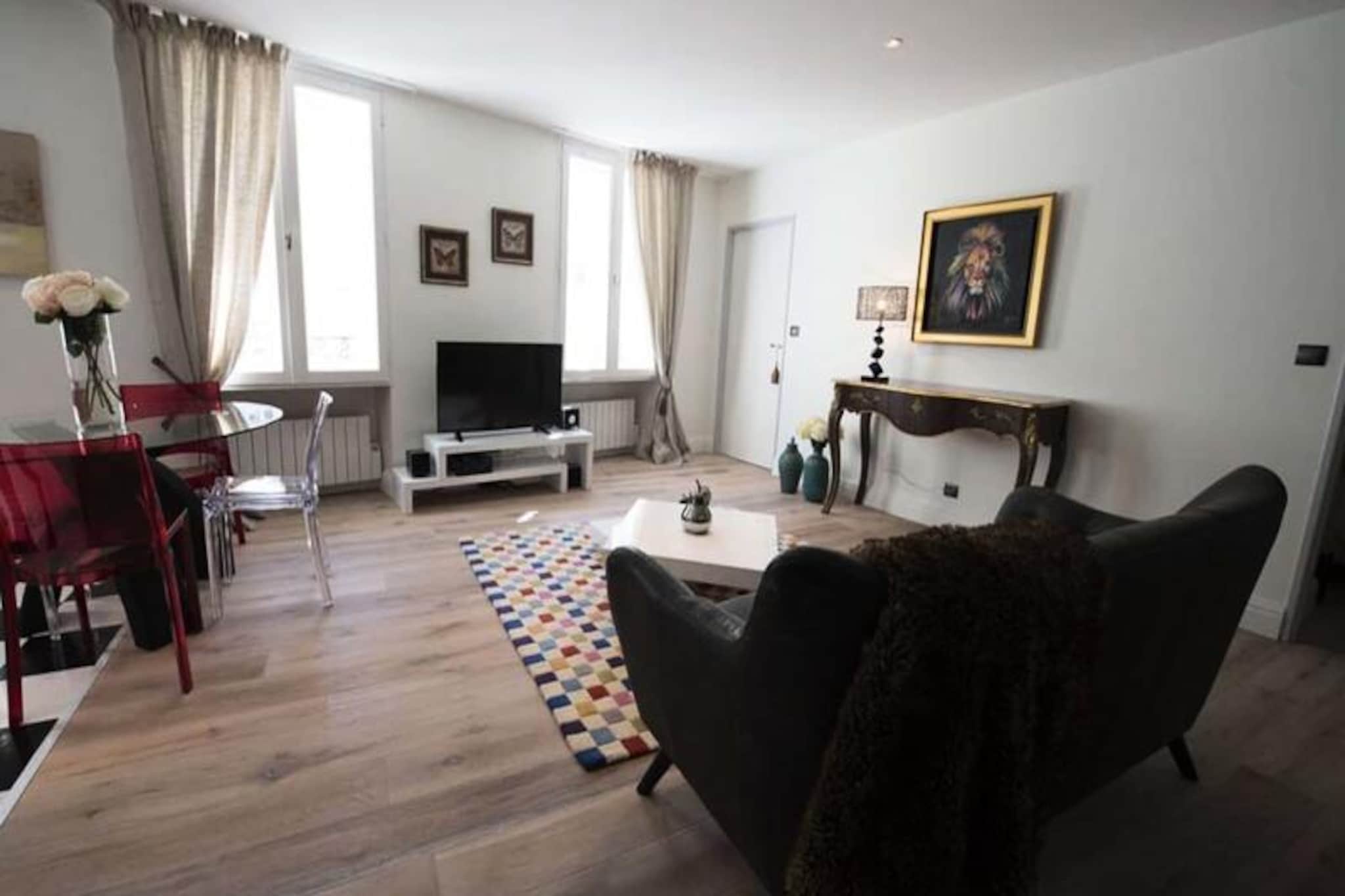 This charming apartment offers the perfect blend of comfort, elegance, and convenience, situated in the heart of the vibrant Gambetta district of Bordeaux. Its prime location provides direct access to the lively Place Gambetta, surrounded by a variety of local cafes, shops, and restaurants, making it an ideal spot for those wanting to experience the authentic atmosphere of the city. The apartment’s spacious living room is furnished with a leather sofa, a large flat-screen TV, and high-speed fiber-optic internet, while the adjacent dining area comfortably accommodates four people. The open kitchen is fully equipped with modern appliances, ensuring a pleasant stay for guests.

The two cozy bedrooms are fitted with memory foam mattress toppers, and the bathroom offers a shower, double sinks, and a hairdryer. The apartment also includes a well-appointed dressing room, an iron and ironing board, and a separate toilet for added convenience. Guests will appreciate the central location with easy access to various attractions, including the Matmut Atlantique stadium and the Bordeaux Exhibition Centre, which are easily reachable by tram.

The surrounding area boasts a rich historical heritage, with nearby attractions like the Saint-Michel district, home to the Basilica of Saint-Michel and its iconic bell tower. The famous Place des Capucins, with its bustling market and antique shops, is also within reach. Bordeaux, a UNESCO World Heritage city, offers a vibrant cultural scene and excellent food and wine experiences, making it the perfect base for exploring the region.





