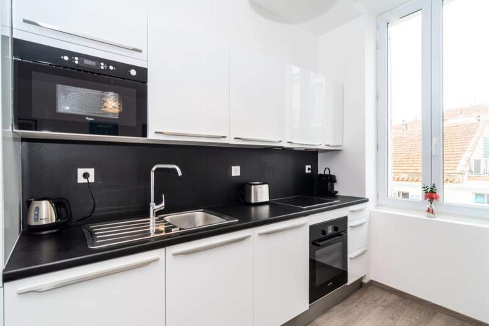 Vacuum Cleaner, Living room(double sofa bed, TV, dining table), Kitchen(electric kettle, coffee machine, oven, microwave, dishwasher, fridge, freezer, dishes and cutlery), bedroom(double bed), bathroom(shower, washbasin), washing machine, heating, air conditioning, ironing board, hairdryer, Towels incl.