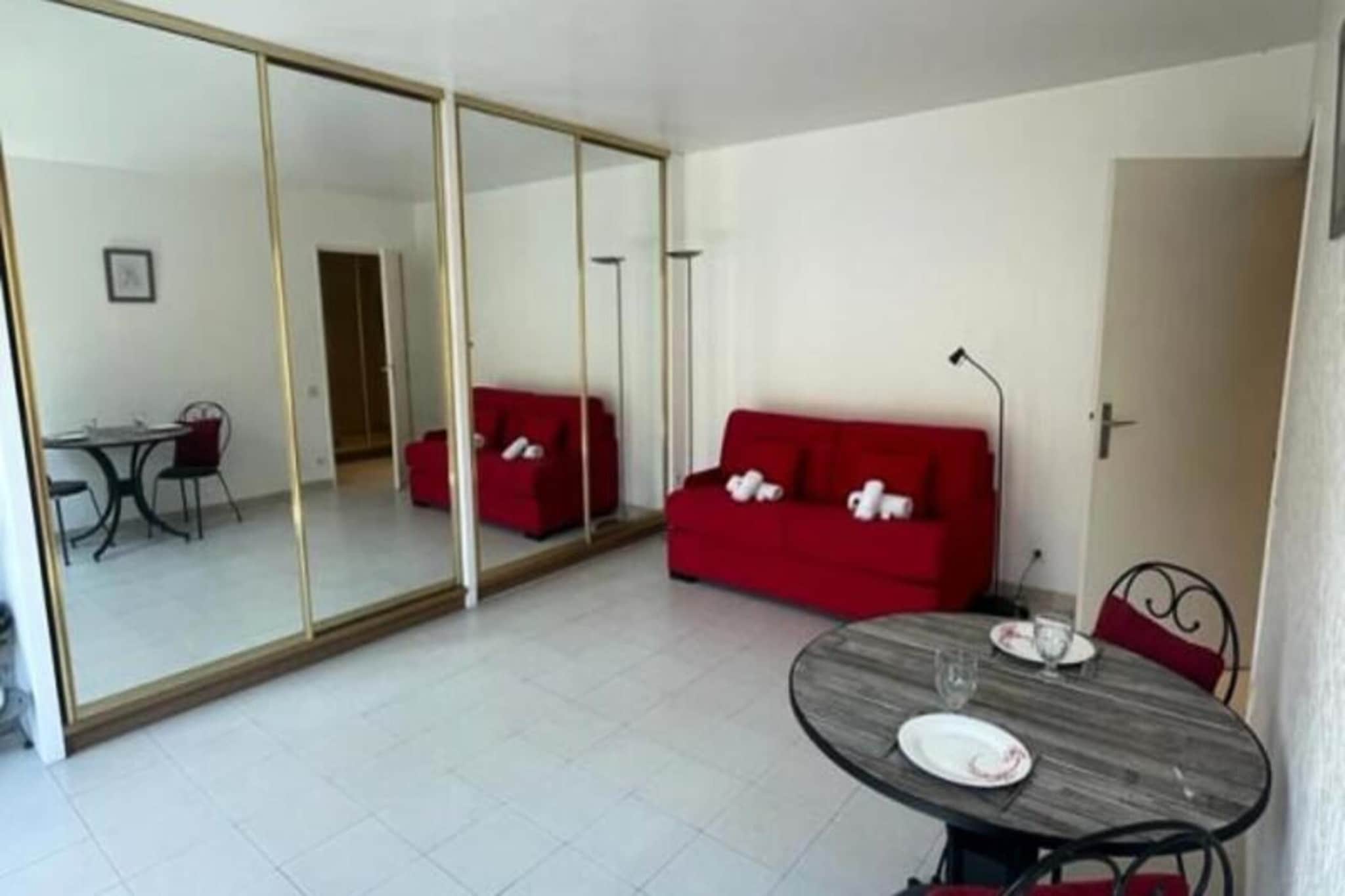 Property along with a cozy and modern design, this studio is ideal for both business and personal travelers. It features a main room with a sofa bed, a dining table that also serves as a work area, and plenty of storage space, including a wardrobe. The semi-open kitchen is fully equipped for all your cooking needs. A covered terrace overlooks a very quiet private courtyard, providing a peaceful setting to unwind.

Located in the heart of Cannes, the studio is within walking distance to all the major attractions. It is just a 5-minute walk to the Palais des Festivals and the closest beach. Rue d'Antibes, known for its shops, restaurants, and cafes, is nearby, as is the Croisette with its luxury shops and beaches. The shuttle to Nice Airport departs from the Hôtel de Ville, only 3 minutes away. Additionally, the iconic Forville Market and a flea market on Mondays provide a unique local experience.

The studio has been renovated with a refined style, ensuring comfort and convenience. Everything is thoughtfully designed, from the lounge and work areas to the kitchen and bathroom. The balcony is perfect for dining or relaxing, with space for up to 4 people. A deposit of €300 is required, and end-of-stay cleaning is included in the booking, though guests are asked to do the dishes and take out the trash before check-out.

