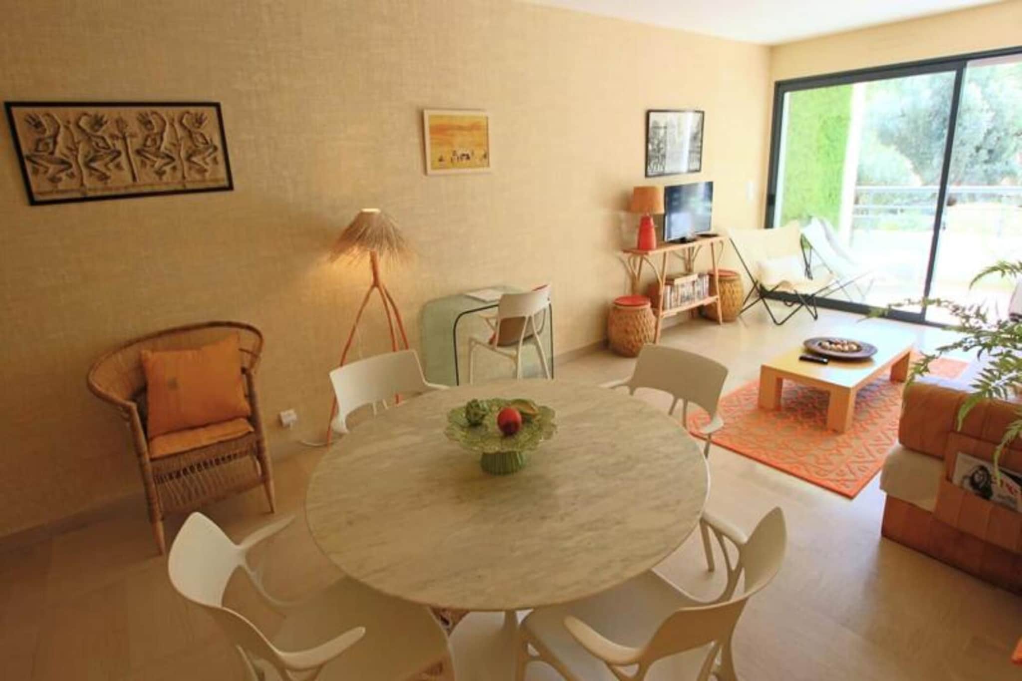 This renovated ground-floor apartment offers a peaceful retreat in the heart of Cannes, located just 150 meters from the stunning Mouré Rouge beach and a mere 5-minute walk from the iconic Croisette. Situated in the renowned Palm Beach district, the apartment is set within a secure and quiet residence, ensuring a restful stay for up to four guests. The property features two well-appointed bedrooms, each with its own bathroom, making it ideal for families or groups. The bright living room opens onto a furnished terrace, offering an open view, a dining table, and a deckchair to relax in the fresh air. The apartment is fully equipped with modern amenities, including air conditioning, Wi-Fi, a washing machine, a flat-screen TV, and a fully stocked kitchen.

Guests will enjoy the convenience of a dedicated parking space and the proximity to numerous attractions. Just steps away from the apartment, you can explore the nearby sailing school, paddleboard rentals, and the family-friendly beaches. The area also boasts a variety of restaurants, cafes, and shops, including the renowned "Place de l'Etang," known for its pétanque ground and local eateries. The Croisette, famous for its luxury boutiques and palaces, is a short stroll away, as is the lively Rue d'Antibes. Public transportation is easily accessible, with bus stops just 80 meters from the apartment, making it easy to explore all that Cannes has to offer. Whether you're seeking relaxation or adventure, this apartment is ideally located to enjoy the best of Cannes.



