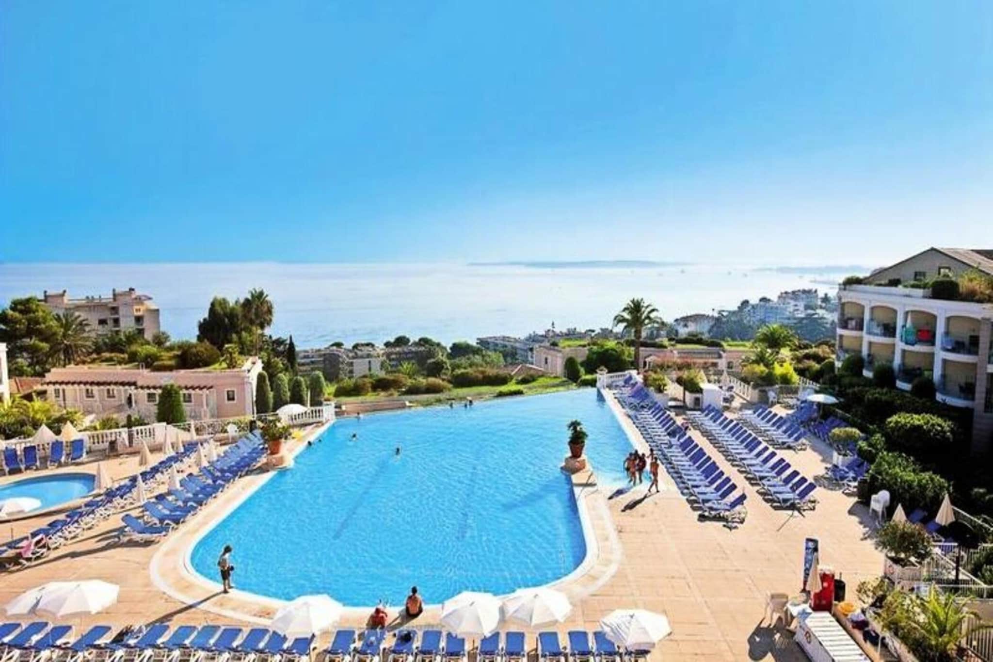 Located in the heart of Cannes, this charming residence offers a cozy retreat for families or friends seeking a relaxing vacation. The vibrant city of Cannes, famous for its Croisette, luxurious yachts, and glamorous atmosphere, sets the stage for an unforgettable getaway. The residence consists of pastel-colored buildings surrounded by lush green gardens, offering a peaceful ambiance and panoramic views of the stunning blue sea.
The residence is ideally situated just a short distance from the beach and the city’s most iconic attractions, including the Palais des Festivals and the Croisette. Cannes' lively atmosphere, with its world-class shops, restaurants, and entertainment venues, is just minutes away. For those traveling with pets or children, there are additional services such as a baby kit and pet accommodations available upon request. With all essential services included and a relaxing environment, this residence is the perfect base for exploring the glamour and beauty of Cannes.
This two-room apartment for up to 4 people features a comfortable living room, a fully equipped kitchen, a bedroom, a bathroom, and a separate WC. Guests can unwind on the welcoming terrace or take a refreshing dip in the infinity pool, open from mid-April to early November.