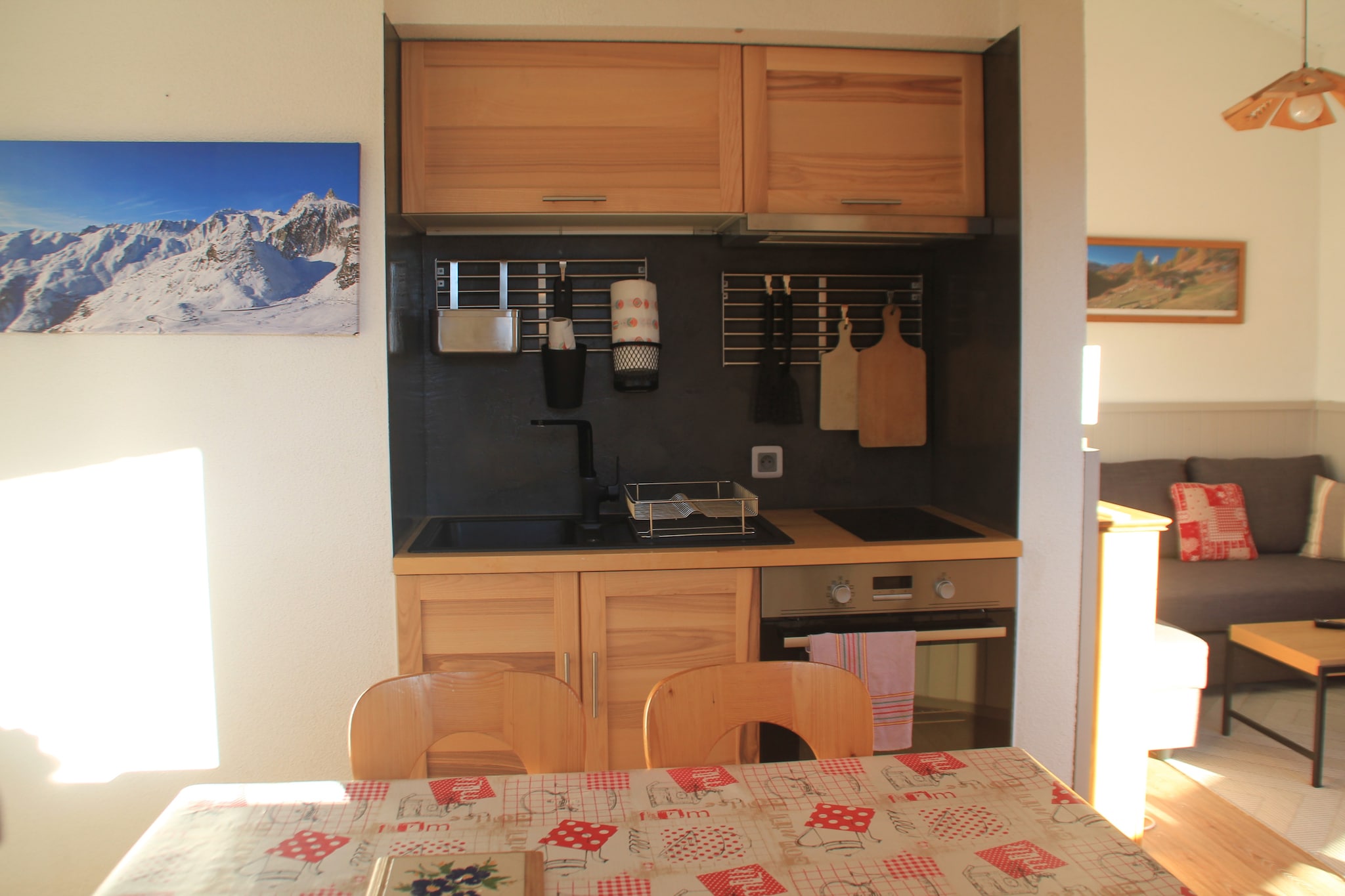 This cozy apartment offers a comfortable retreat for up to four guests, featuring a bright living area with a flat-screen TV and access to a balcony with breathtaking valley views. The sleeping arrangements include a bedroom with a double bed and a sofa bed in the living room, ensuring a relaxing stay. A ski locker is available for convenient storage, and a private garage provides secure parking for those traveling by car. Situated on the third floor and accessible by stairs, this peaceful accommodation does not allow pets, maintaining a clean and allergy-friendly environment.  

Located in a quiet area, the apartment is just 1 km from the Barbossine chairlift, offering quick access to the ski slopes. A free shuttle bus stops nearby, connecting guests to the village center, which is 2 km away. There, visitors can explore local shops, charming cafÃ©s, and a traditional market offering fresh regional products. Several restaurants serve authentic Savoyard cuisine, perfect for enjoying local specialties. In addition to winter sports, guests can experience scenic hiking trails and mountain biking routes in the stunning surroundings of the Portes du Soleil.  

Designed for convenience, the apartment features an open-plan kitchen equipped with a ceramic hob, oven, dishwasher, toaster, and filter coffee maker, ideal for preparing homemade meals. The bathroom includes a shower and toilet, ensuring a comfortable stay. The private balcony offers a serene setting to unwind while admiring breathtaking views over the valley, making it an excellent choice for a relaxing mountain getaway.

Note: The tourist tax will be collected at the property and is not a part of rental.