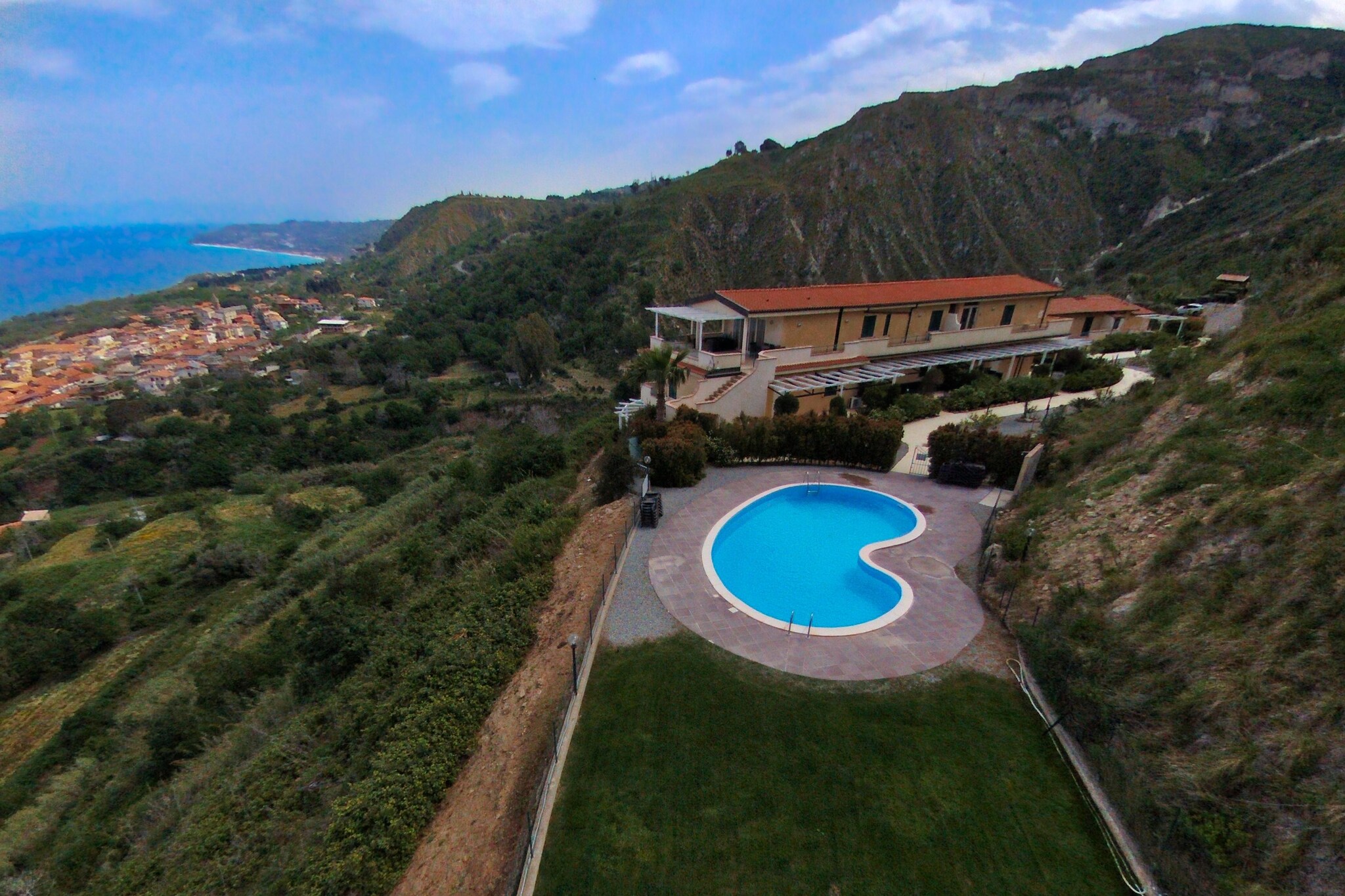 On the 1st floor: (Living room(double sofa bed, seating area), open kitchen(electric kettle, coffee machine, combination microwave, dishwasher, fridge-freezer), bedroom(double bed), bedroom(2x single bed), bathroom(shower), air conditioning, terrace)\n\ngarden(shared with other guests), garden furniture, parking, deckchairs, swimming pool(shared with other guests, opened from Apr upto and including Oct)