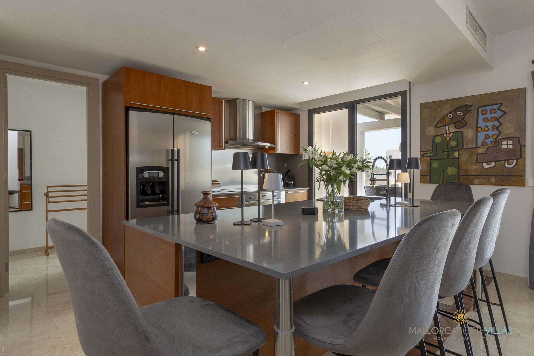 Ground floor: (Living room(TV, dining table, seating area), Kitchen(electric kettle, toaster, coffee machine, oven, microwave, dishwasher, fridge-freezer, Juicer, dishes and cutlery, Cooking basics), bedroom(single bed), Bedroom with bathroom(double bed, bath tub, washbasin), Bedroom with bathroom(double bed, bath tub, washbasin), Bedroom with bathroom(double bed or 2 single beds, shower, washbasin, toilet), toilet, Internet access)\n\nElevator, Garden Furniture , washing machine, balcony, air conditioning, terrace, BBQ, parking, swimming pool(shared with other guests), iron, hairdryer