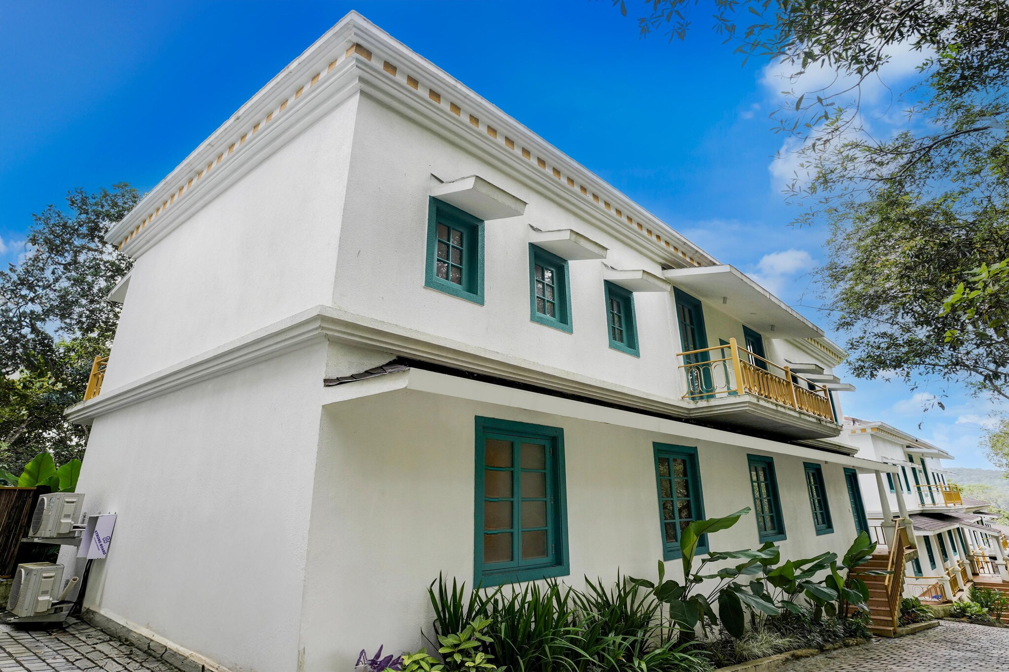 Discover your perfect getaway in our stunning 3BHK villa, nestled in the serene beauty of Siolim, Goa. This hidden gem offers an exquisite blend of comfort and tranquility, allowing you to unwind while enjoying the vibrant local culture and breathtaking beaches nearby. Step into the expansive living area, where natural light flows seamlessly into your private pool and deck—ideal for sunbathing or a refreshing dip. Enjoy cozy evenings in the air-conditioned living room, or gather around the dining table for meals or board games. The fully equipped open-plan kitchen caters to all your culinary needs, while an outdoor BBQ setup invites you to host delightful al fresco feasts.
Located just a stone's throw from famous beaches like Morjim, Ashvem, and Anjuna, as well as a variety of top eateries and local attractions, our villa is the perfect base for exploring Goa. Daily housekeeping services allow you to relax without any worries.
Each of the three spacious bedrooms features a king-sized bed and an ensuite bathroom, ensuring a restful night’s sleep. The ground-floor master bedroom offers serene garden views, while the two first-floor bedrooms come with private balconies, perfect for fresh air and relaxation. Stay connected with high-speed WiFi and entertainment options available in every room. With 24/7 security, power backup, and dedicated parking, your comfort and safety are our top priorities. For food lovers, a chef-on-call service is available with 48 hours' notice, ensuring delightful meals at your convenience.
Book your stay today and indulge in the luxurious lifestyle you deserve!