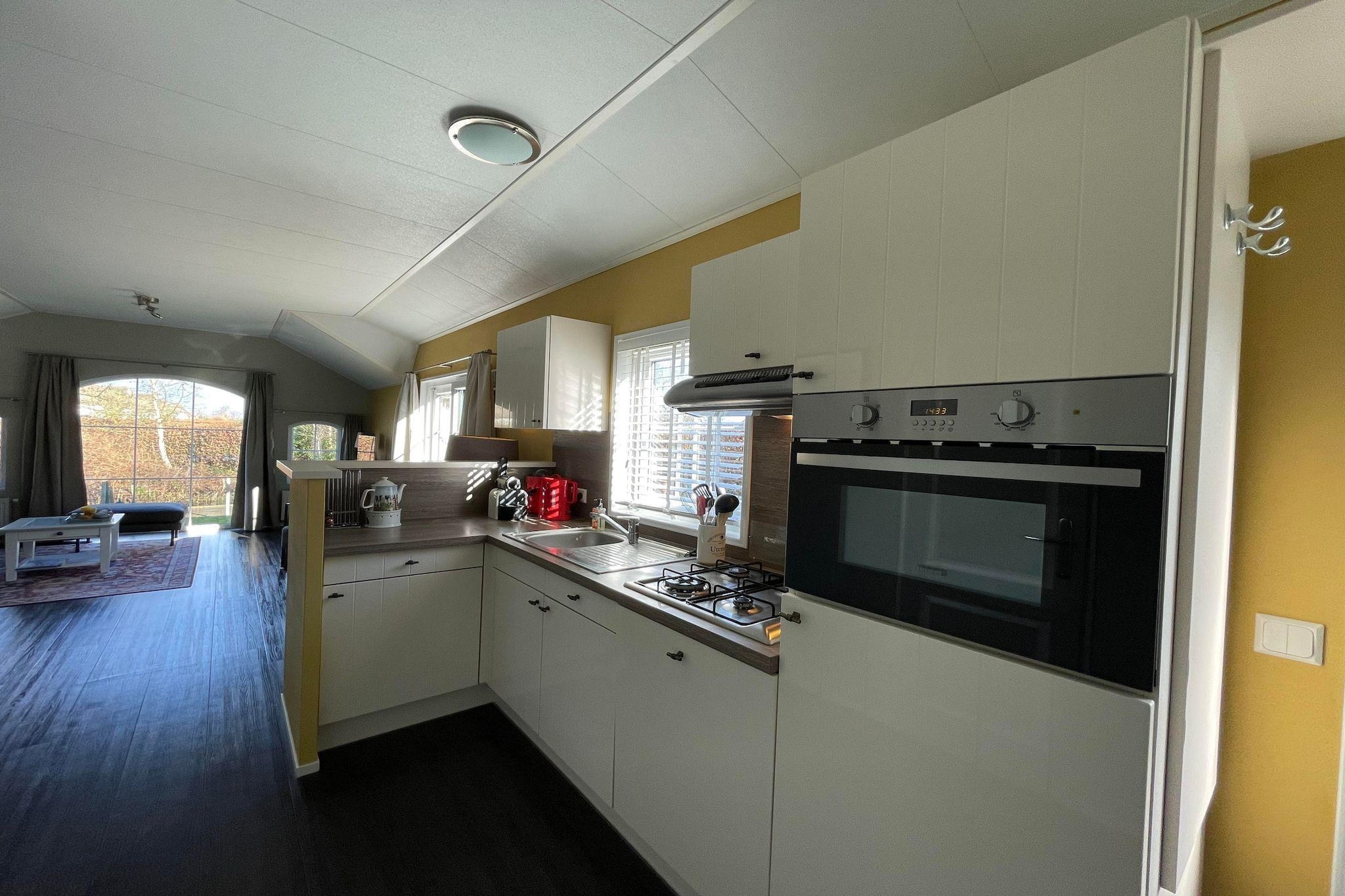 Tucked into a peaceful estate in Friesland, this charming single-level Home offers a relaxing escape for families and seniors. Surrounded by forest and water, it features a private mooring and a cozy interior designed for comfort and tranquility. With three inviting bedrooms, the chalet sleeps up to 4 guests and is ideal for those seeking nature and simplicity.

Step outside and youâ€™re just moments from woodland trails and the scenic Frisian lakes, including Langweerderwielen and Sneekermeer. A golf course borders the estate, and bicycles are available to rent or bring along, making it easy to explore the countryside at your own pace.

Whether you're enjoying a quiet morning by the water, cycling through the forest, or sailing across the lakes, this chalet offers a perfect base for your Friesland adventure, all in a serene, natural setting.