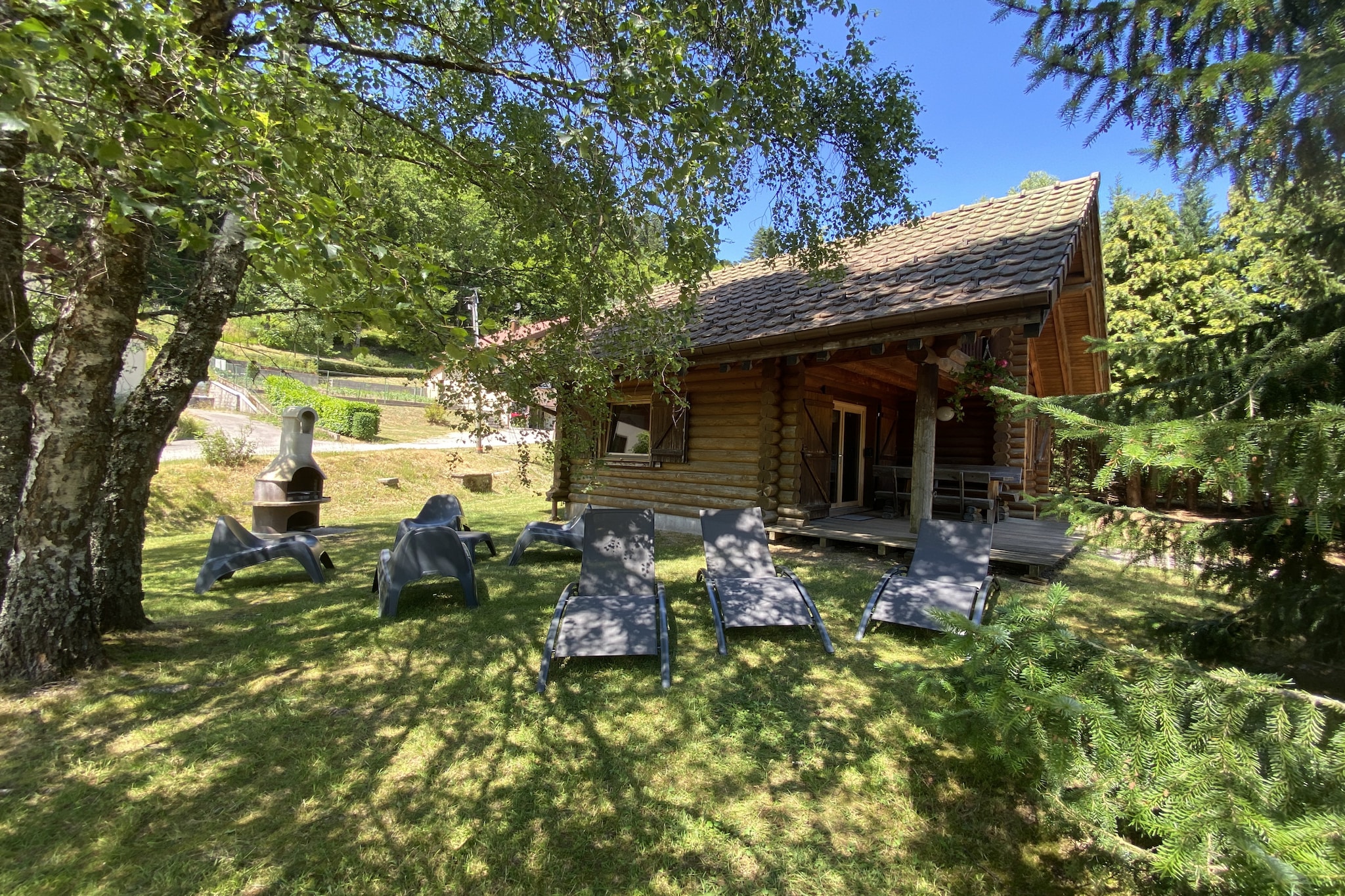 L'OURS BLANC Chalet en rondins-Buitenlucht