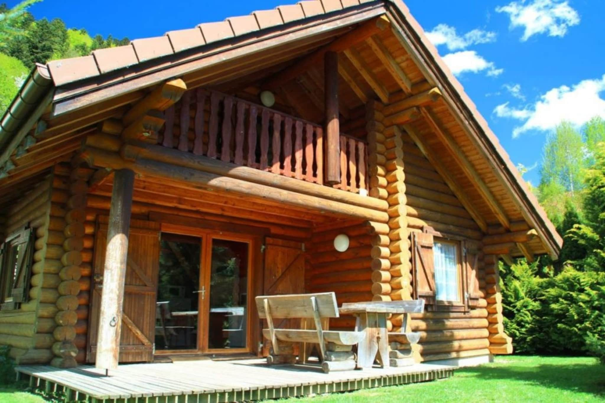 L'OURS BLANC Chalet en rondins-Buitenlucht