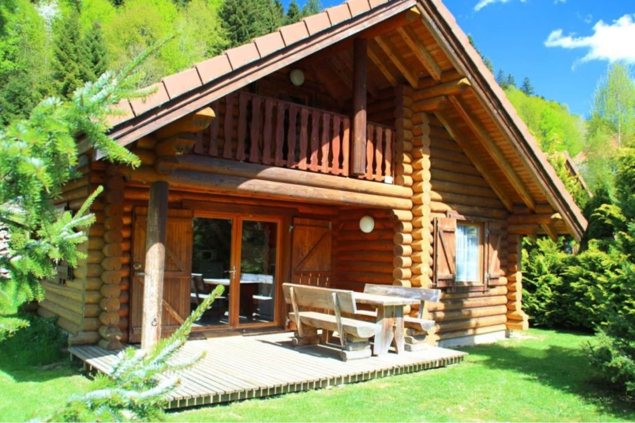 L'OURS BLANC Chalet en rondins-Buitenlucht