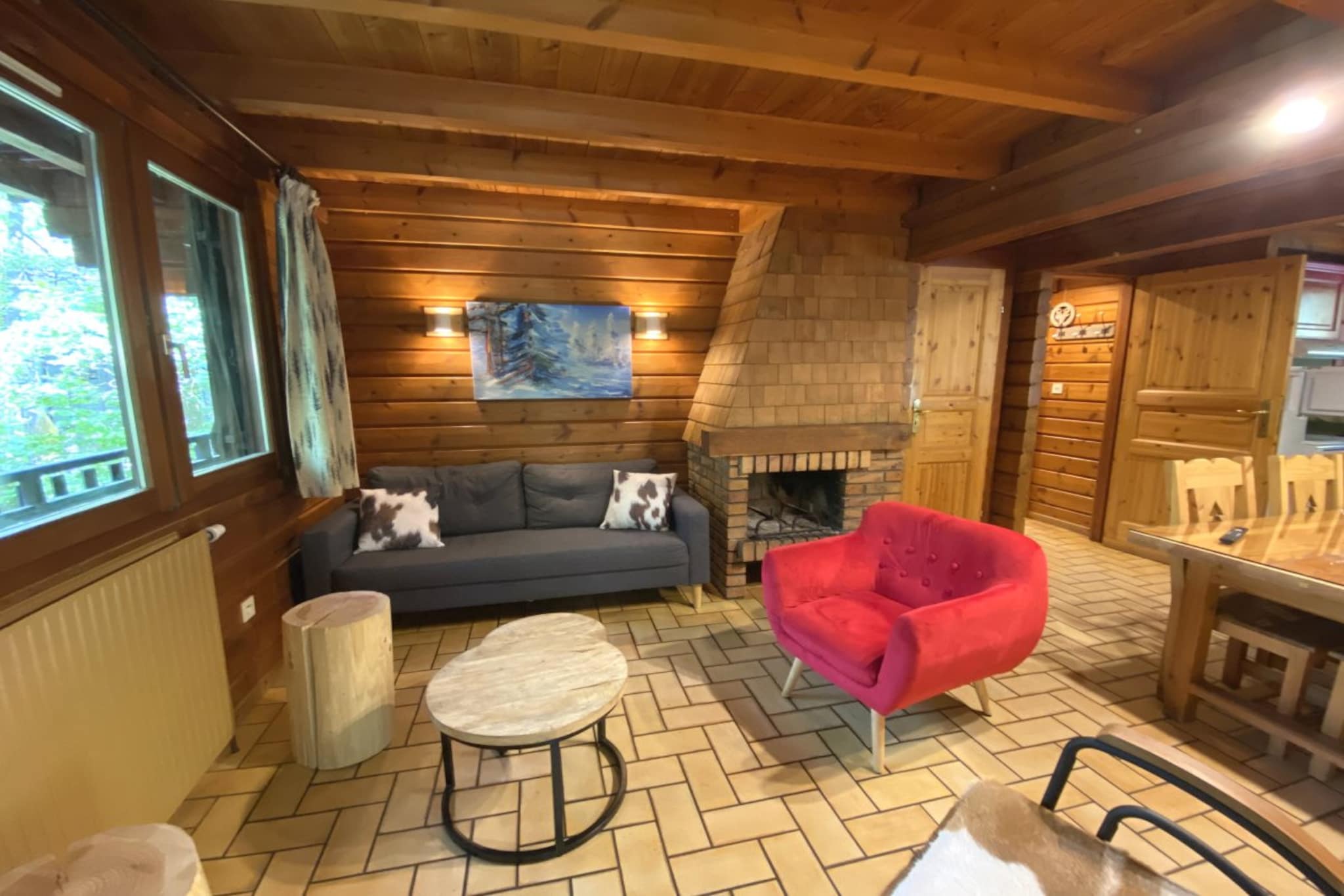 LE MONTAGNARD Chalet en bois-Woonkamer