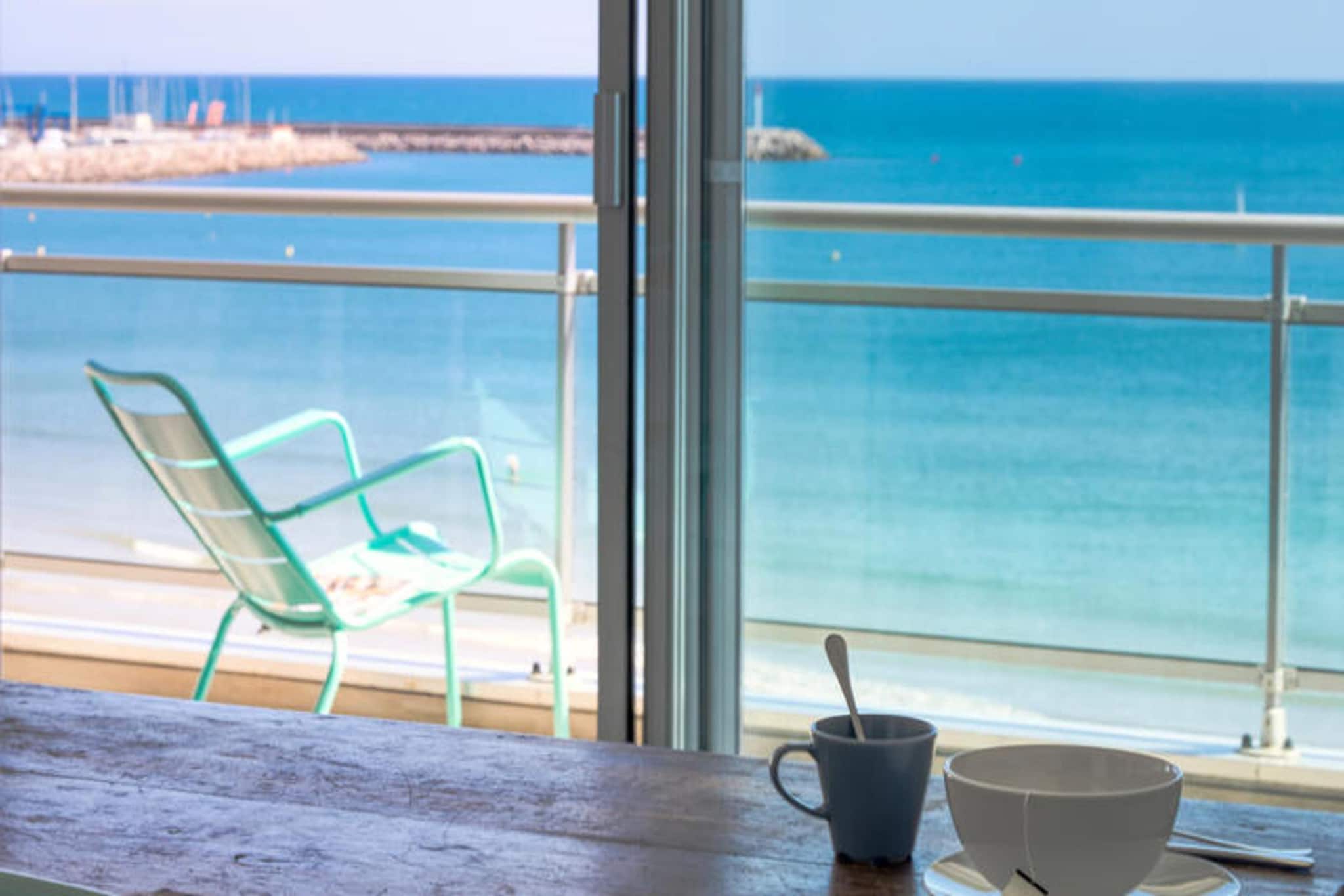 First line – First concierge

Apartment 1 to 4 people – Palavas les flots, seaside.

Spend your vacation by the water, with a view of the sea, with your eyes in the blue.

A Front Line apartment selected by Première Concierge for its unique location, its view and its volumes. Every morning when you get up, you will be able to contemplate the life awakening on the sea, in the afternoon you will have the pleasure of every moment of the vacation. And in the evening? each evening will be different with its changing light. With your eyes in the blue of the Mediterranean Sea for a few days or a few weeks you will become the privileged inhabitants overlooking the bay that passers-by envy when they raise their heads. The happiness of the present moment.
A magnificent view, a terrace for relaxing “First Line” in complete privacy. A kitchen that invites you to prepare the evening meal because this evening there is no need to go to the restaurant on the beach, the show is in front of you. A bedroom for parents, a bedroom for children.

Crossing apartment of 70 m², fully air-conditioned. Kitchen, ceramic hob, extractor hood, washing machine, dishwasher, fan oven, coffee maker, fridge and freezer, table and chairs. Living room equipped with a television, high-speed wifi internet, storage cupboard. Children's bedroom equipped with two beds (2x90cm wide) with drawers, desk. Parents bedroom equipped with a king size bed (160cm wide), wardrobe. Bathroom equipped with a shower, 2 sinks, washing machine. Separate WC. Fully air-conditioned apartment located on the 4th floor with elevator. Private parking and optional baby bed.

We liked: its breathtaking view of the sea, a very beautiful renovation, excellent quality of equipment, a large terrace, elevator, air-conditioned apartment.

The apartment is equipped with every comfort. Free high-speed Internet. WIFI. Television. Bus, Bus line 131 Palavas, bus every hour to Montpellier. Car, Montpellier south motorway exit. Montpellier Méditerranée Airport 10 minutes away. Please download “Waze” for your journey.


