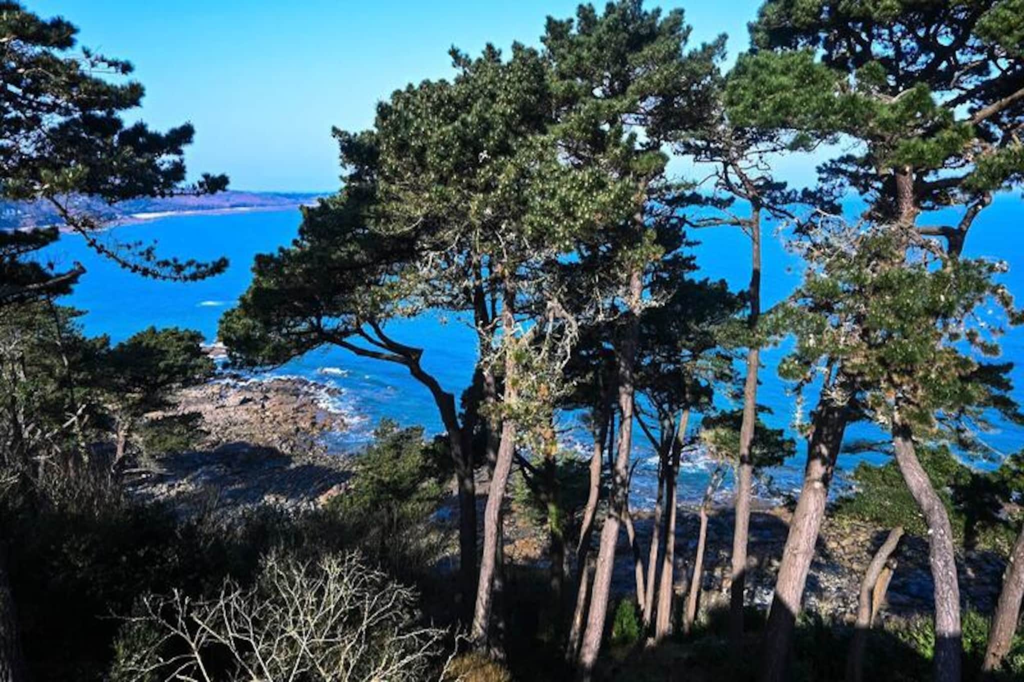 Omnipresent, the panoramic sea view captivates the eye throughout the day and amazes you in the evening at sunset. you always have the impression of being in direct contact with the sea. All while enjoying proximity to the center of Perros Guirec and direct access to hiking trails. 

With its 4 bedrooms, it welcomes you for a simple family vacation in Northern Brittany. This family home has a living room overlooking the garden.

Welcome to our holiday home located in the heart of Perros! This recently renovated home has four comfortable bedrooms and two bathrooms, perfect for accommodating up to 8 people. With a breathtaking view of the sea, you can relax in the garden, equipped with deckchairs and a plancha for outdoor grilling.

The residential area is quiet and peaceful, giving you an absolute relaxing experience. The beaches of Trestraou and Trestrignel are just a few steps away and you can access all water activities like sailing school and surfing. The Friday morning market is also just a short walk away, where you can buy fresh, local produce to cook in the fully equipped kitchen.

You can enjoy the city on foot because everything is nearby. The house has an ideal location for exploring Perros and its surroundings. We look forward to welcoming you to our home and helping you enjoy your stay in this beautiful region of Brittany. Book now for an unforgettable vacation experience

THIS PROPERTY OFFERS:

DETAILS OF ROOMS, BEDS and BATHROOMS: 
- 4 bedrooms for 8 people
- bedroom 1: 1 double bed 160 (on the ground floor) 
- bedroom 2: 2 single beds 90 (1st floor)
- bedroom 3: 2 single beds 90 (1st floor)
- bedroom 4: 2 single beds 90 (1st floor)

- 1 bathroom with shower and bathtubs in bedroom 1 
- 1 bathroom on the first floor
- 1 toilet on the ground floor and 1 toilet on the 1st floor


EXTERIORS / LEISURE EQUIPMENT: 
- Electric plancha, garden furniture, deckchairs
- the entire garden of the manor
- Trestraou beach 10 minutes walk
- Trestrignel beach 5 minutes on foot
- Bakery, shops and market 5 minutes walk
- exceptional sea view
- Parking is on the street, in the immediate vicinity of the house. Parking is free and spaces are available all year round. the access visible in the photo (near the garden) is reserved for the owner to access his property.
- it should be noted that the house is part of the property of a manor (used as a secondary residence), each of the properties has its own private space (the small garden visible in the photo),

NOTE: 
- A deposit of €1,500 will be required upon entry to the premises.
- internet connection
- Possibility of renting bicycles.
- Possibility of ordering a shopping list for your arrival.
- So that you can enjoy our beautiful region, a cleaning fee of €150 will be required.
- Linen and towels option €10/person or €15/person beds made


A private concierge service is also at your disposal during your stay. Delivery of meals, bicycles and shopping before your arrival possible upon reservation. Massages, theme evenings (eg pancake evening or birthday evening), suggestion and reservation of activities are also possible.
