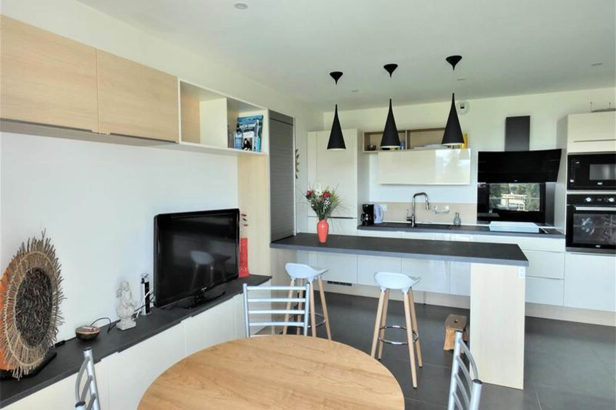 At 193, Chemin des Moellerons in Aix les Bains

Small luxury residence, between town and lake.
About 2km from the City Center, the Tourist Office, 3 km from the Chevalley Thermal Baths, 
About 2 km from the lakeside, 20 km from Mont REVARD. (D.5 on the plan)
300m from the bus stop, pharmacy, bakery. 

It consists of 3 floors with elevator, videophone, private parking on the south side of the Residence, a plot of garden used as a vegetable garden for some owners, with some private cabins.

Its location will allow you to combine business with pleasure. 5 minutes by car from the city center and or the lakefront. A stone's throw from the Corsuet forest, a favorite place for everyone wanting to take a few walks outside the city while remaining close to it.
Very nice, spacious and very functional 3-room apartment 
On the 3rd floor with elevator - In Prestige range 
Classification in furnished tourist accommodation in 3* for 4 people 
Surface area of ​​approximately 65m² facing south with balcony 

Entrance hall and hallway (tiled floor): 1 shoe cabinet, 1 mirror, 1 console, 
1 lamp.
Living room (tiled floor) opening onto balcony, south facing: 1 corner sofa, 1 coffee table, 1 wooden sideboard, 1 chair, 1 round table and 4 chairs, 1 small wooden stool, 1 flat screen television. 
Kitchen open to the living room: 1 large worktop with 2 high stools, fridge/freezer, 4 induction hobs, multifunction oven, microwave, extractor hood, dishwasher, 1 electric coffee maker, 1 toaster, 1 kettle, crockery and cookware. 
Bedroom with North window (PVC floor): 1 140cm bed, 2 bedside tables, 2 lamps, 1 chair, 1 red Voltaire armchair, 1 wall cupboard with wardrobes and shelves.
Bedroom with North window (PVC floor): 1 160cm bed, 2 bedside tables, 2 lamps, 1 white wicker armchair, 1 wall cupboard with wardrobes and shelves, 2 chairs, 1 console.
Fully tiled bathroom: double sink unit, bathtub with curtain, electric towel dryer, 1 wooden shelf unit.
WC (tiled floor): 1 washing machine, 1 storage unit.
MISCELLANEOUS: videophone, semi-collective heating with individual radiators, smoke detector.
Animals not tolerated. 
Rented with 1 private “unnumbered” parking space located at the rear of the residence and access with a remote control or vigik.
Additional services at extra cost: end-of-stay cleaning, bed linen, bathroom linen, pets, baby bed (subject to availability on request).
Deposit (in euros) - 1000
Heating - 1
