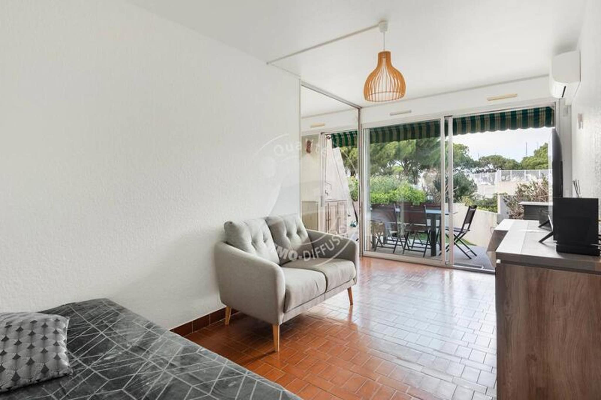 Résidence "le Quai Aux Fleurs"-Woonkamer