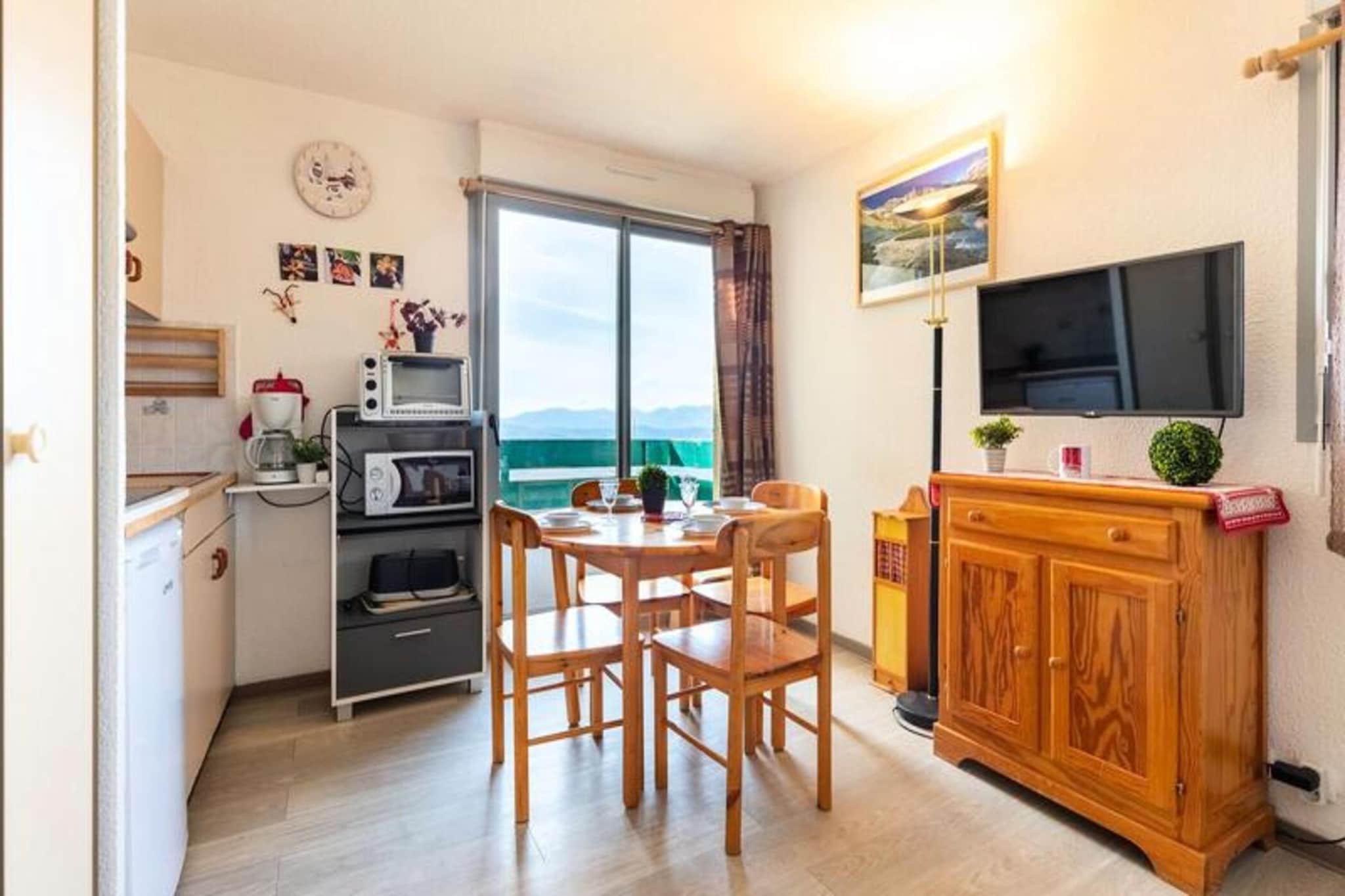 
This cozy apartment, ideal for a group or family of up to four, offers direct access to the slopes, ensuring you can make the most of your time in the mountains. A large window frames breathtaking views of the Pyrenees, filling the space with natural light and serenity. The property is thoughtfully designed for a comfortable stay, with heating provided for warmth and relaxation. Please note that pets are not allowed, ensuring a clean and tranquil environment for all guests.

Located just 100 meters from the slopes, this property is a dream destination for skiing and snowboarding enthusiasts. Within 300 meters, you’ll find a selection of cafes, restaurants, and shops, offering local delicacies and convenient options for your stay. Outdoor adventure awaits with activities such as snowshoeing, snowmobiling, and canyoning, all organized by certified professionals. The lively surroundings ensure that whether you’re seeking relaxation or adventure, there’s something for everyone.

The apartment features a practical and well-equipped kitchenette, perfect for preparing meals after a day of outdoor activities. A private bathroom with a shower, sink, and toilet ensures comfort and convenience. The living area is a cozy retreat where you can unwind and soak in the views of the stunning mountain range. With easy access to nearby attractions and all essential amenities, this property is an excellent choice for a memorable mountain getaway.