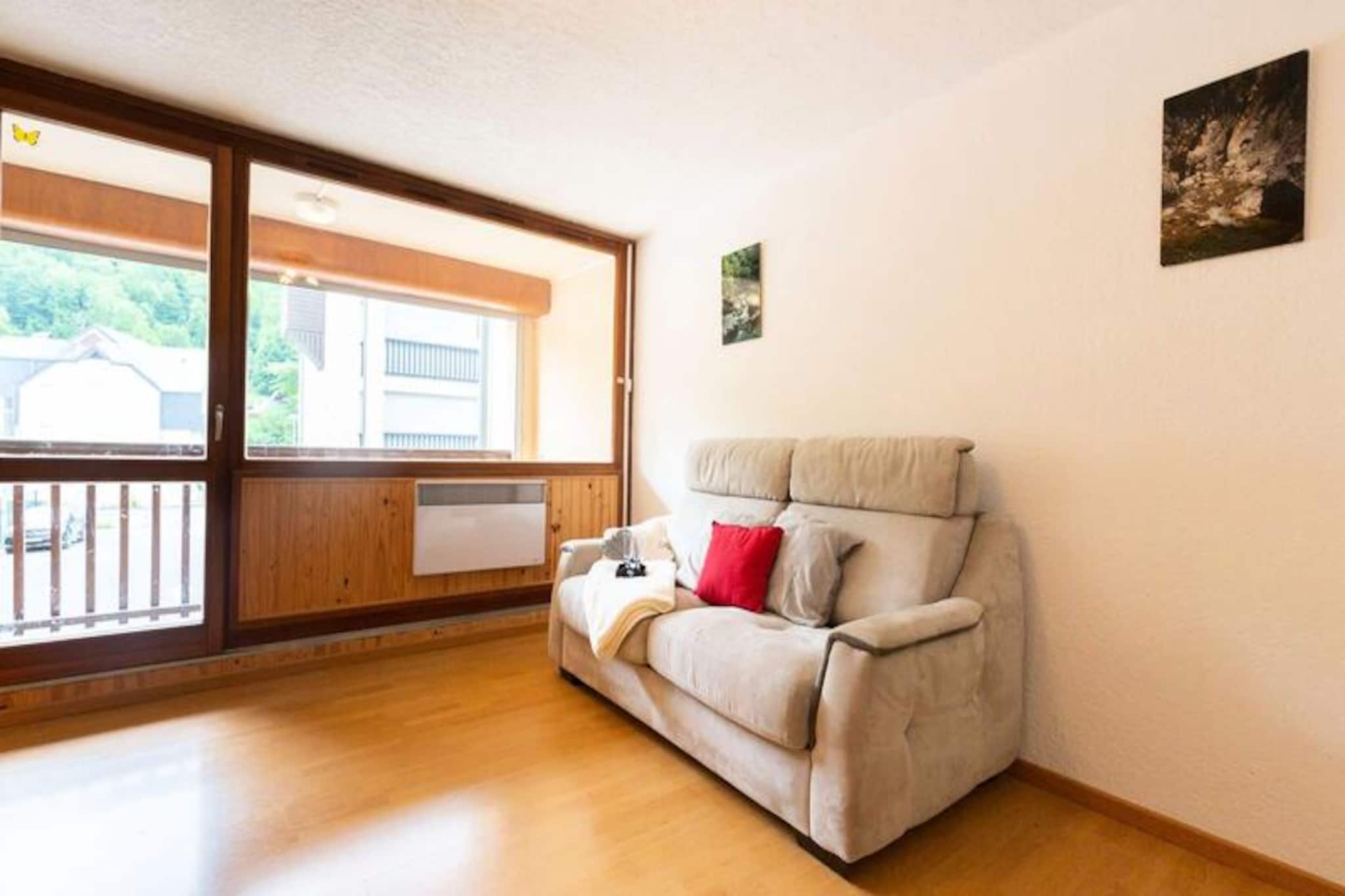 
This cozy studio apartment is perfect for up to 4 guests and features two 90cm bunk beds in the sleeping area and a double sofa bed in the living room. The property is pet-free and provides a TV for entertainment. Located on the 1st floor with elevator access, it also includes a balcony with an east-facing exposure, offering a pleasant view to start your day.

The apartment is conveniently located near shops and only 200 meters from a free shuttle stop that takes you directly to the cable car or the gondola in the thermal baths sector, providing easy access to the slopes at Pla d'Adet. Guests can enjoy nearby cafes, markets, and a variety of outdoor mountain activities such as snowshoeing and snowmobiling.

The apartment offers a functional kitchen area overlooking the living room, perfect for preparing meals during your stay. It also has a separate shower room and WC for your convenience. For added comfort, heating is available to ensure a warm and pleasant environment throughout your stay.