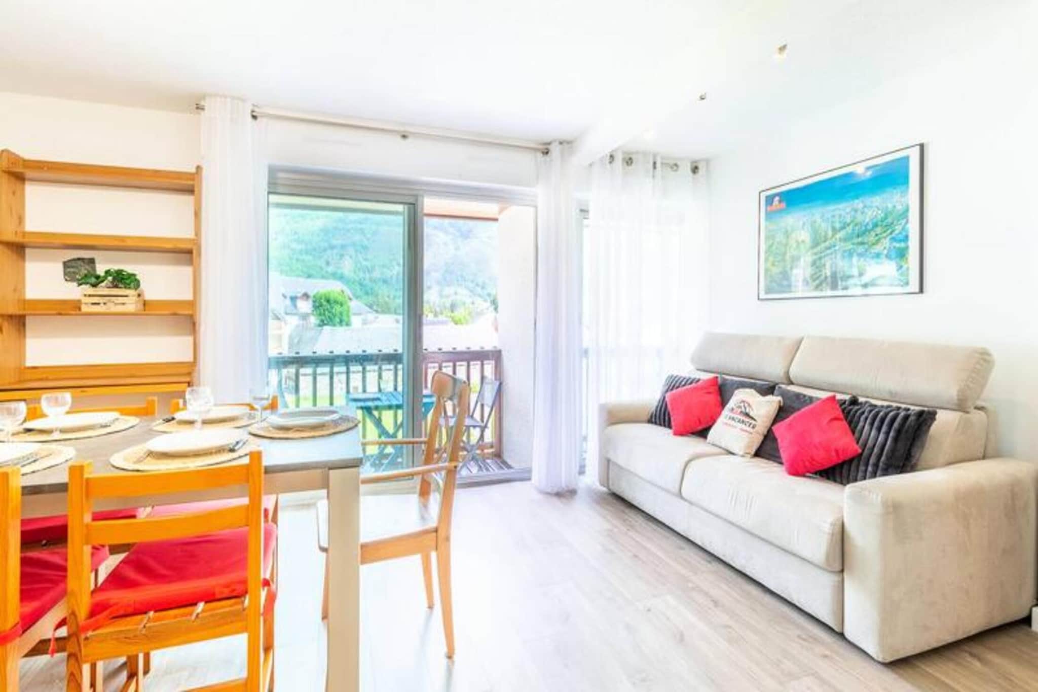 This spacious 59m² apartment is located on the 2nd floor of a prestigious residence in the heart of Saint Lary Soulan, perfect for up to 11 guests. It offers two separate bedrooms, a cabin with a mezzanine bed, and a fold-out sofa in the living room. The master bedroom and the second bedroom both come with double beds, and the second bedroom also includes two bunk beds. There is a balcony that offers a beautiful view of the mountains and the main street of the village. The apartment is not pet-friendly and includes a separate shower room and WC, along with a dedicated space for family and group stays.

The apartment is ideally situated, just 800 meters (about 10 minutes by foot) from the ski slopes and gondola that provide direct access to the mountain. The village center is easily accessible with cafes, restaurants, and local shops just steps away, making it perfect for those wanting to explore Saint Lary Soulan's vibrant atmosphere. A free shuttle service to the ski lifts and thermal baths is also available nearby for your convenience.

The apartment features a well-equipped kitchen with a microwave, oven, and dishwasher, as well as a comfortable living area. The separate shower room and WC add extra convenience. The residence also offers options like a cleaning package and sheet rental upon request to make your stay even more comfortable. Municipal parking is just 50 meters away, and unloading is available in front of the residence.